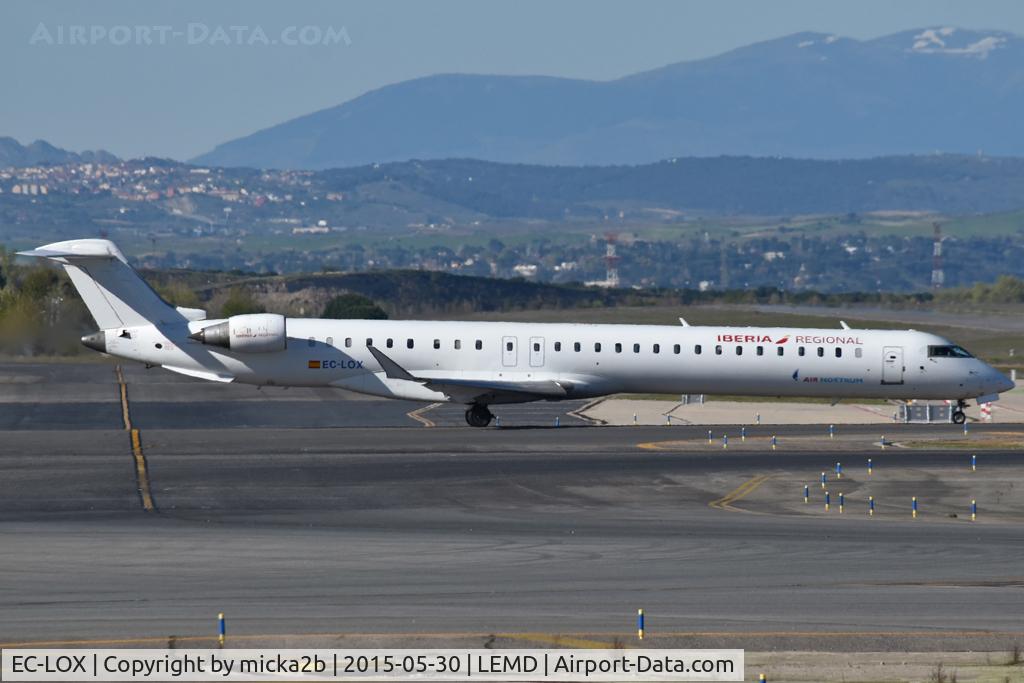 Aircraft EC-LOX, 2011 Bombardier CRJ-1000ER NG (CL-600-2E25), c/n 19020, Taxiing, at LEMD, photo by micka2b