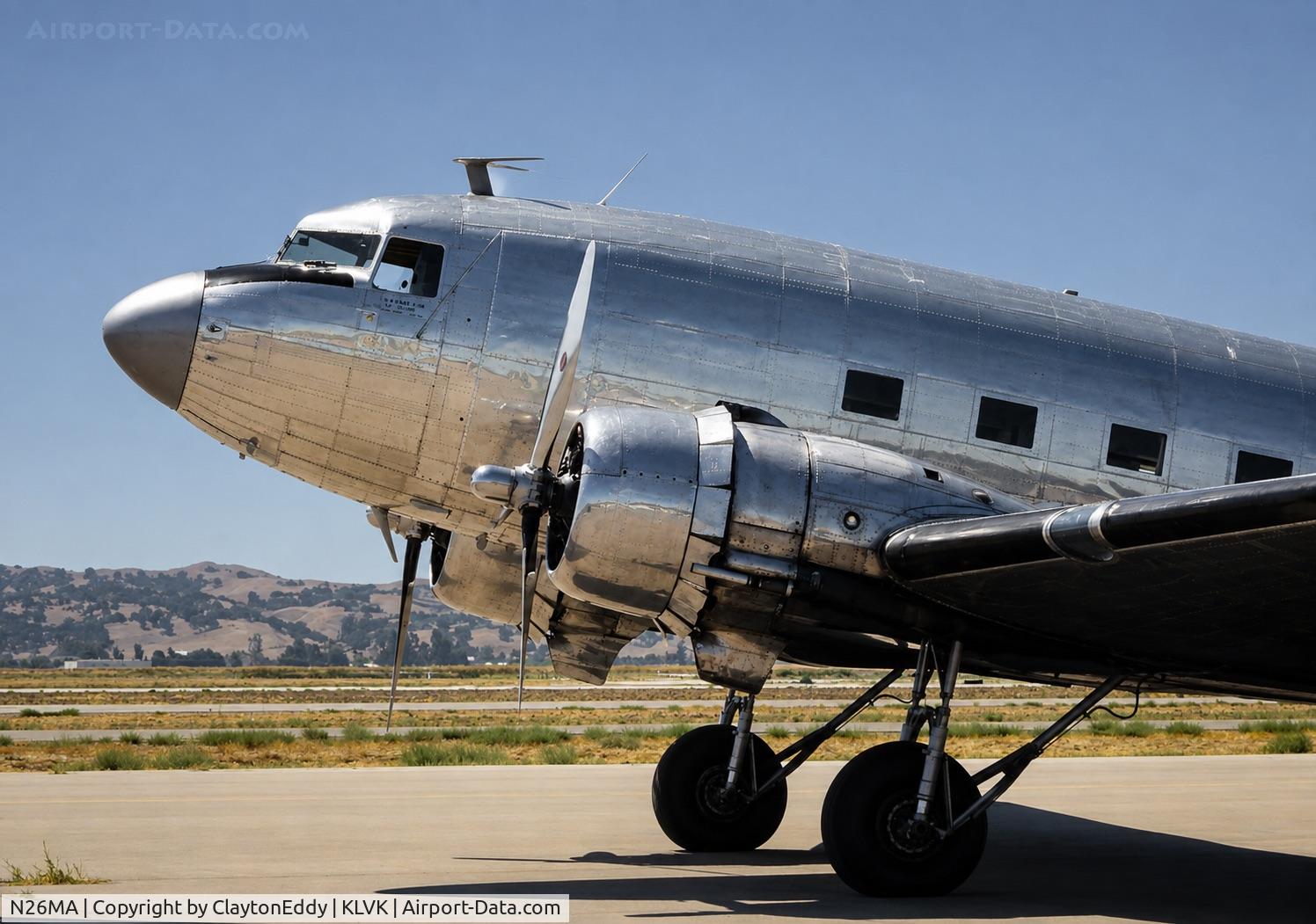 Aircraft N26MA, 1939 Douglas DC-3-G102A, c/n 2169, Wings for Charity Airshow Livermore airport in California 09-95, at KLVK, photo by ClaytonEddy