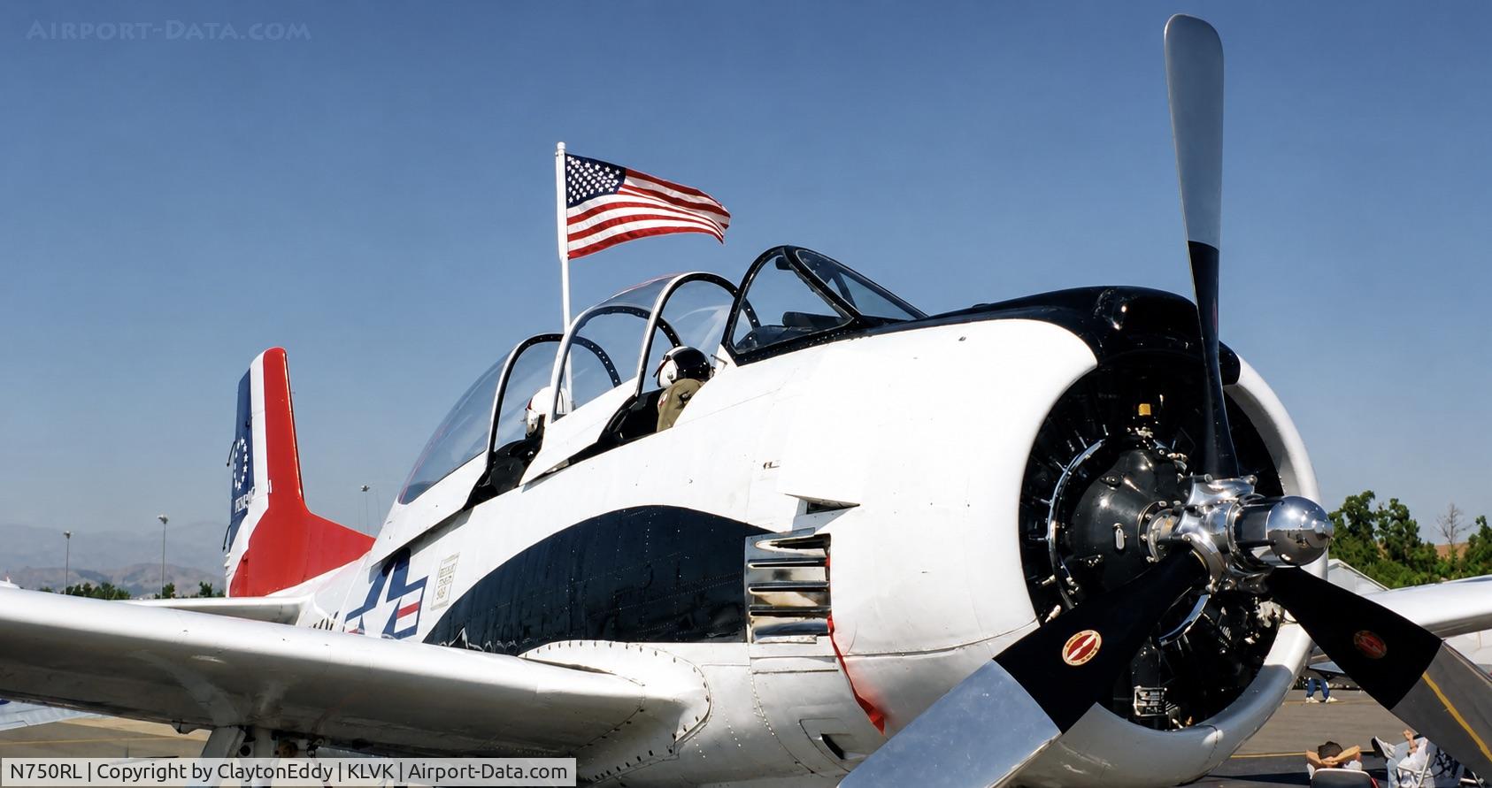 Aircraft N750RL, North American T-28B Trojan, c/n 200-113 (137750), Livermore airport airshow 1992, at KLVK, photo by ClaytonEddy