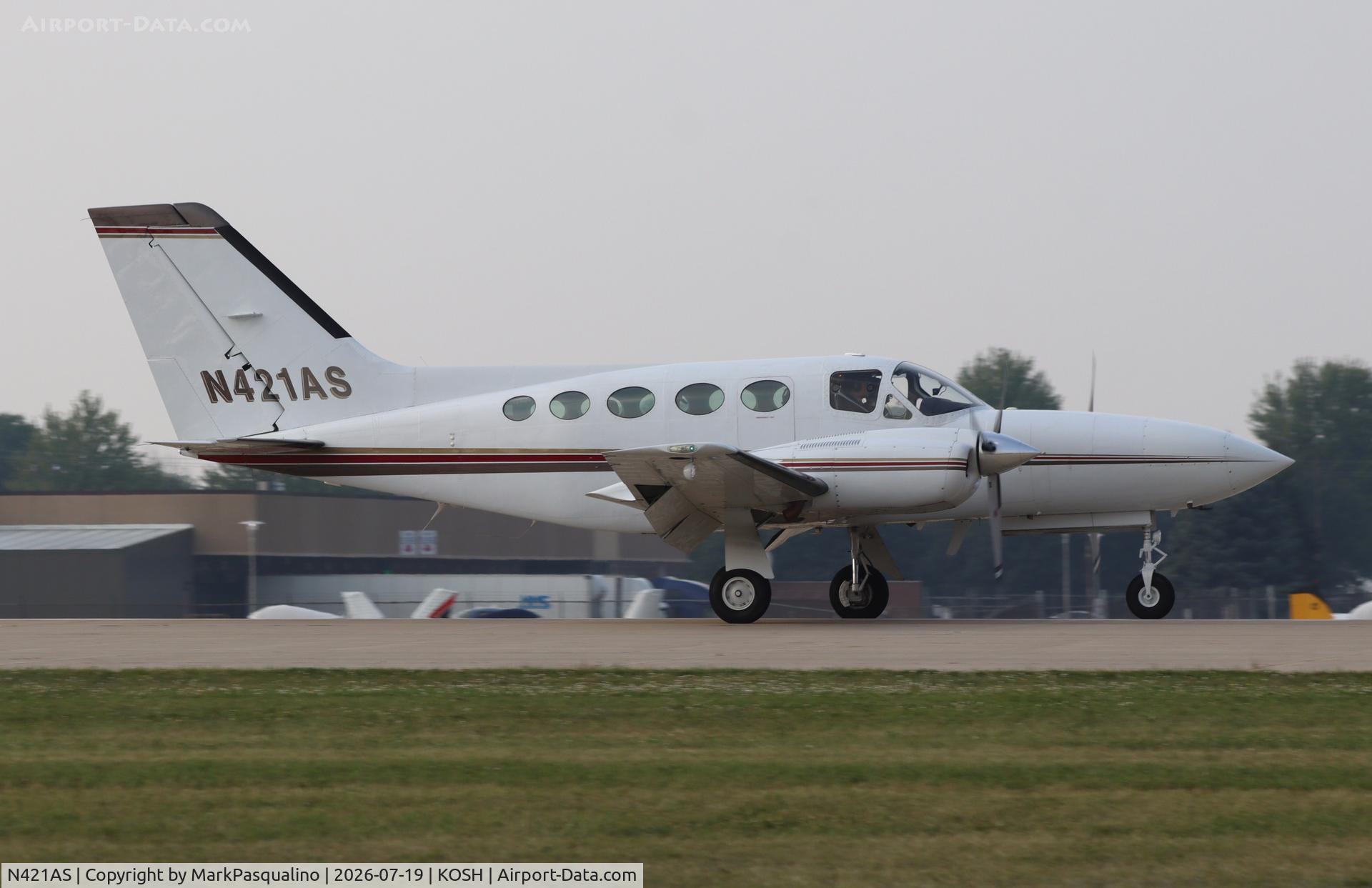 Aircraft N421AS, 1976 Cessna 421C Golden Eagle, c/n 421C0163, Cessna 421C, at KOSH, photo by MarkPasqualino