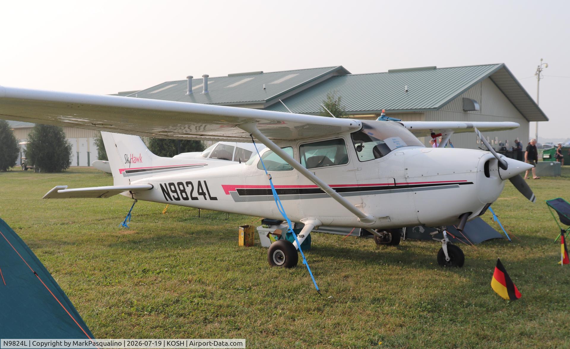 Aircraft N9824L, 1986 Cessna 172P, c/n 17276624, Cessna 172P, at KOSH, photo by MarkPasqualino