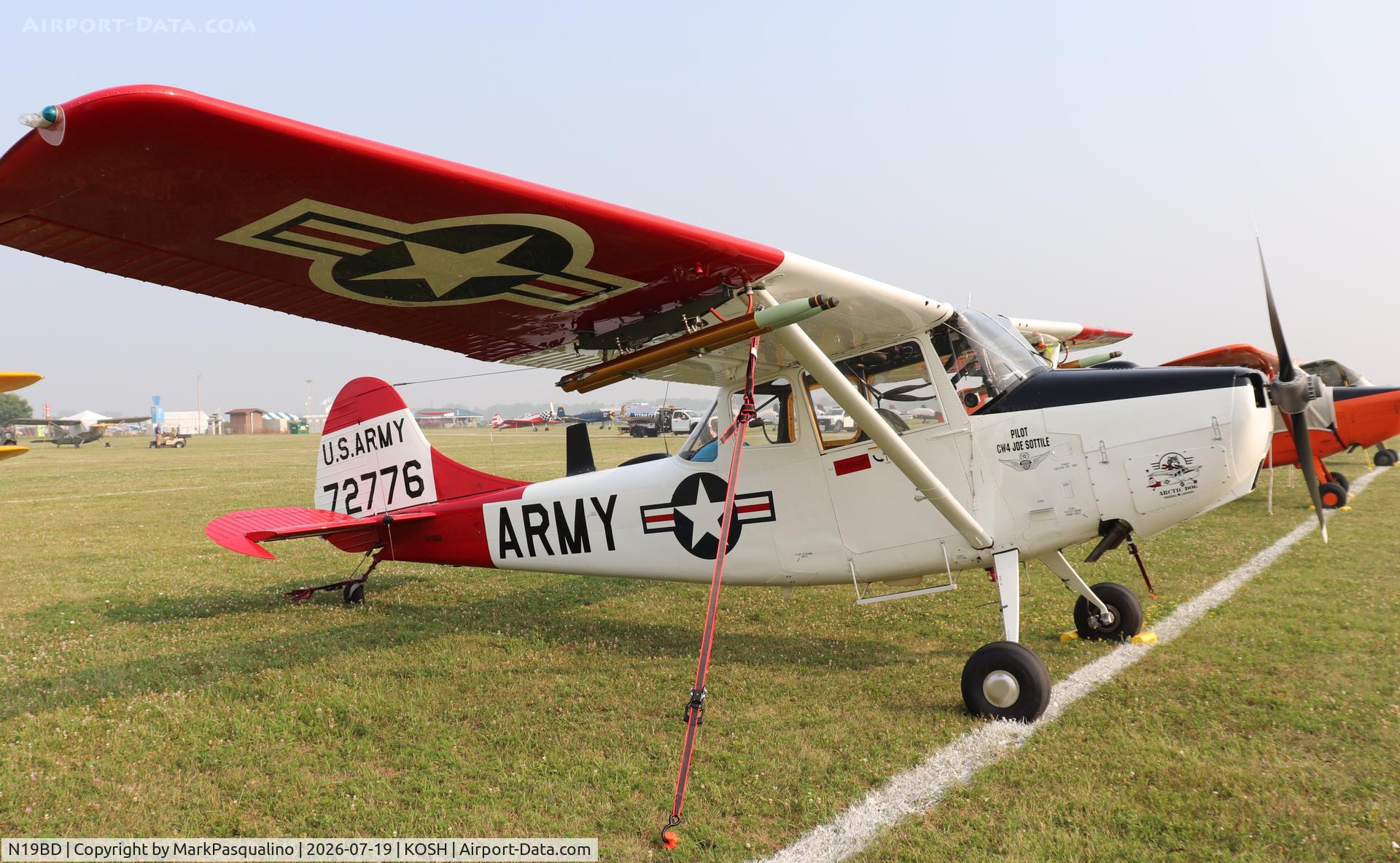 Aircraft N19BD, 1971 Cessna 305B, c/n 23954, Cessna 305B, at KOSH, photo by MarkPasqualino