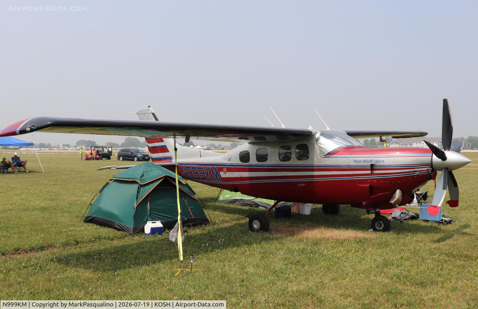 Aircraft N999KM, 1979 Cessna P210N Pressurised Centurion, c/n P21000387, Cessna P210N, at KOSH, photo by MarkPasqualino