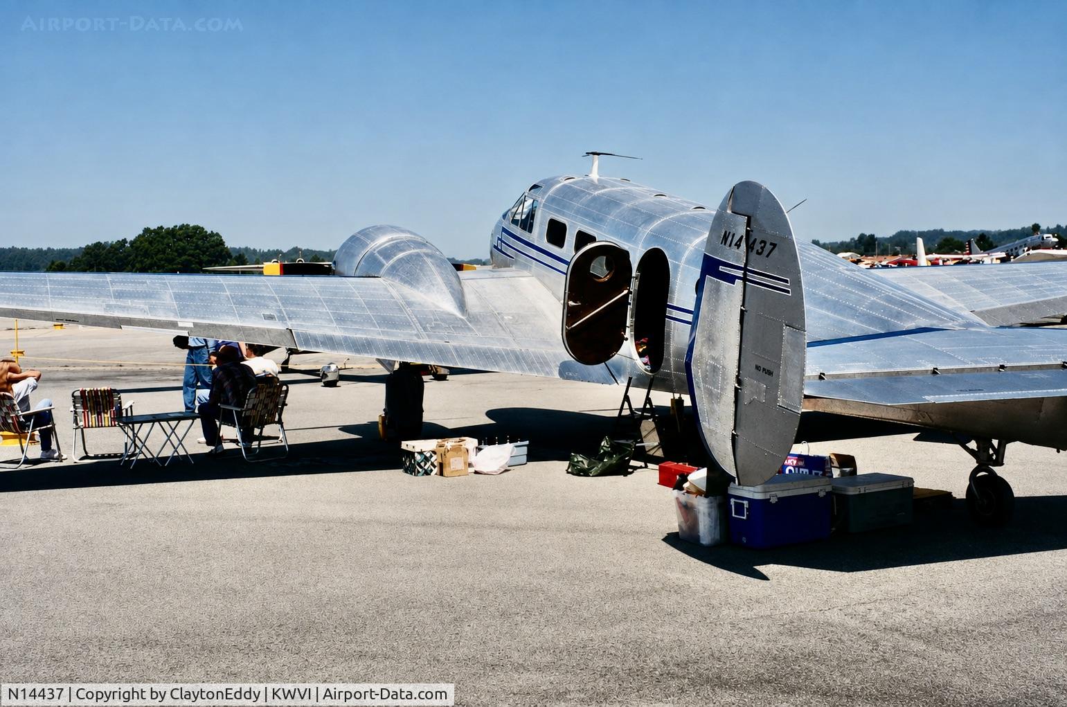 Aircraft N14437, 1952 Beech Expeditor 3NM, c/n CA-202, Watsonville airport airshow California 1995., at KWVI, photo by ClaytonEddy