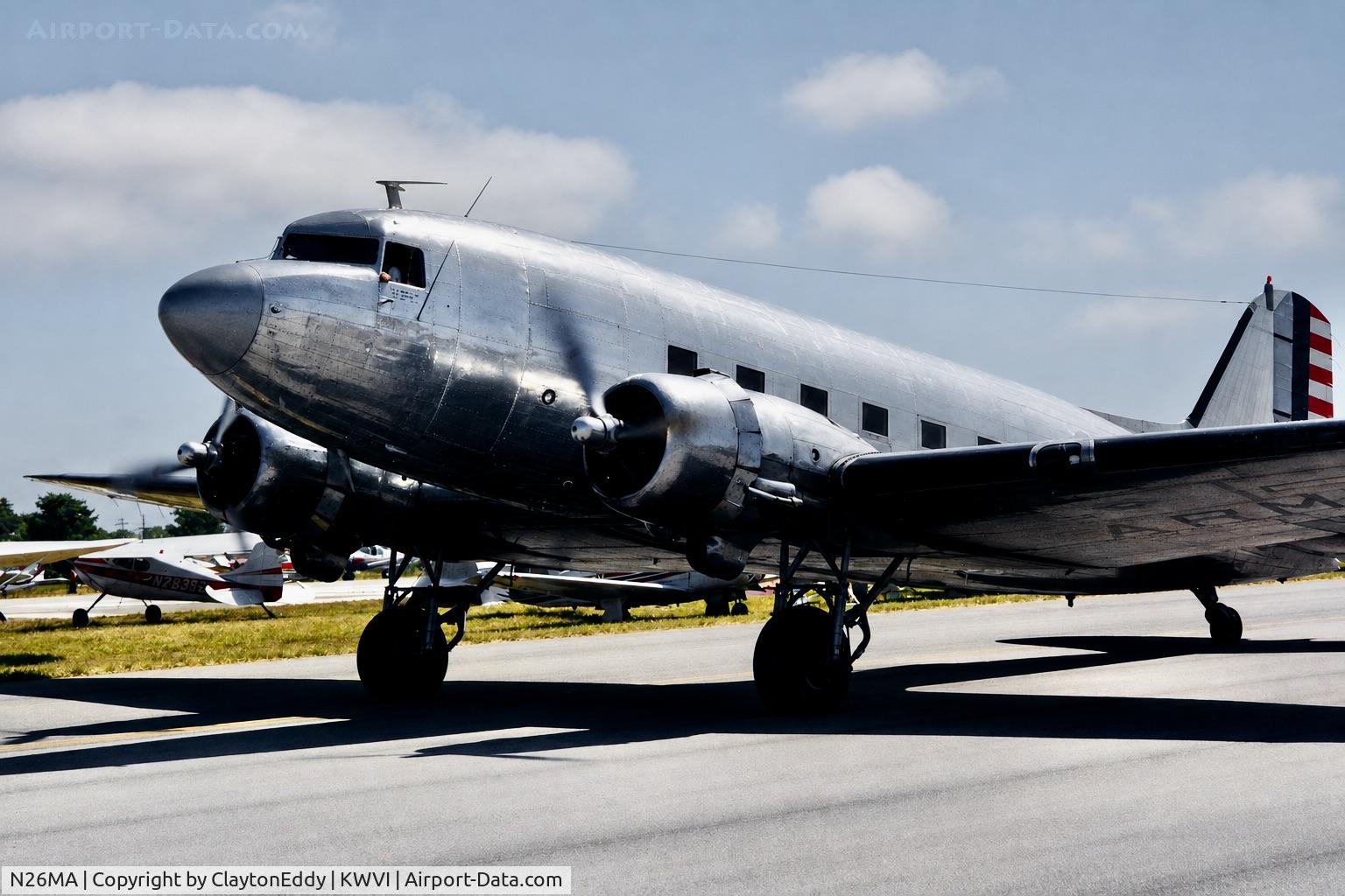 Aircraft N26MA, 1939 Douglas DC-3-G102A, c/n 2169, Watsonville airport airshow in California 1995., at KWVI, photo by ClaytonEddy