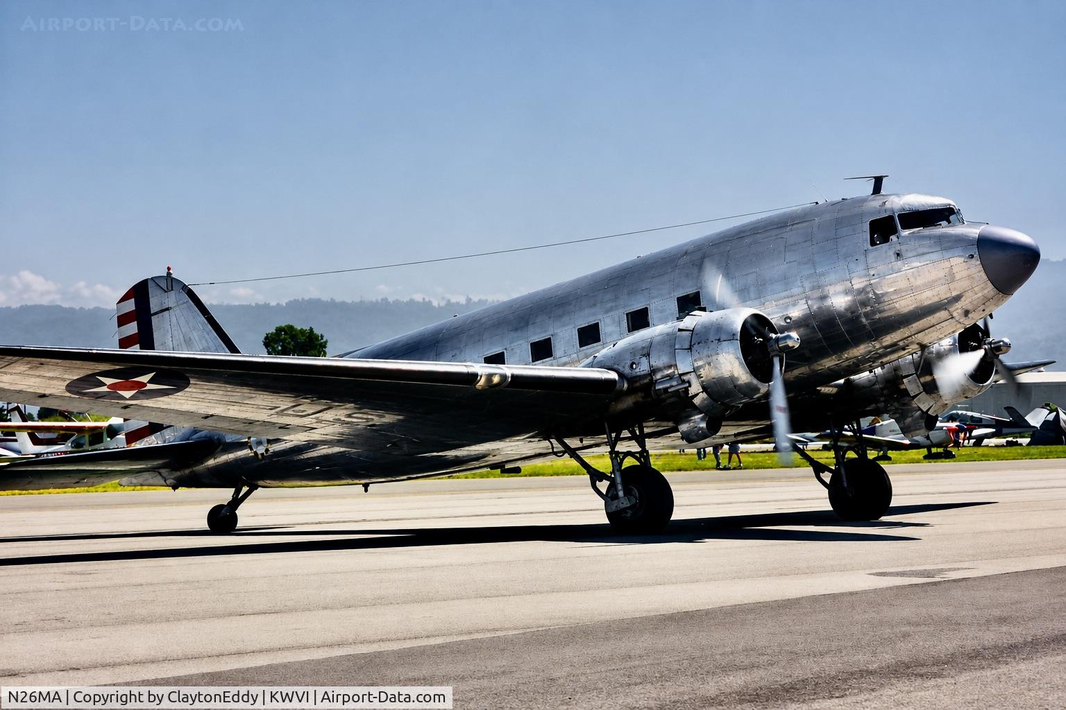 Aircraft N26MA, 1939 Douglas DC-3-G102A, c/n 2169, Watsonville airport airshow in California 1995., at KWVI, photo by ClaytonEddy