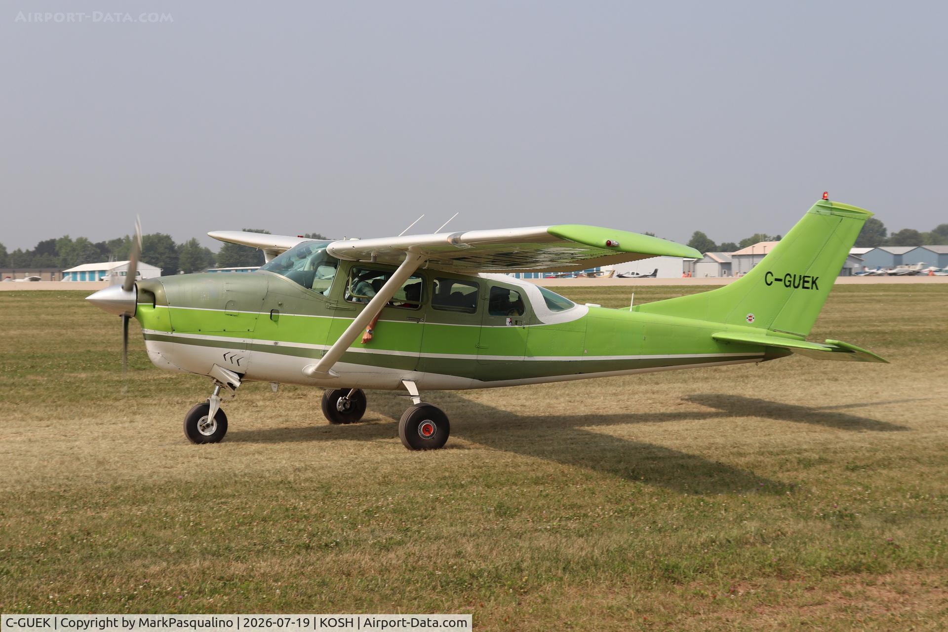 Aircraft C-GUEK, Cessna P206D Super Skylane, c/n P2060564, Cessna P206D, at KOSH, photo by MarkPasqualino