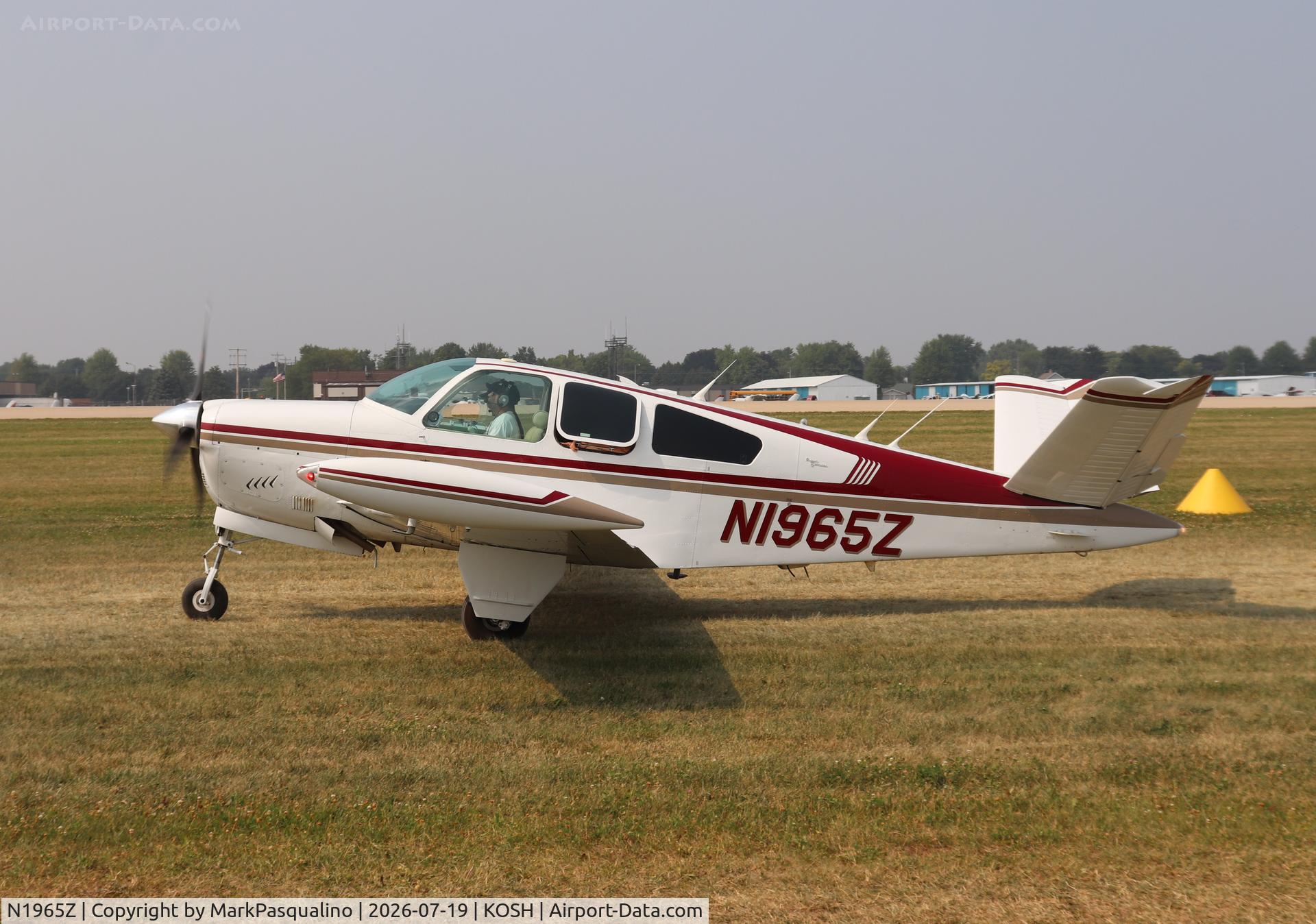 Aircraft N1965Z, 1965 Beech S35 Bonanza, c/n D-7805, Beech S35, at KOSH, photo by MarkPasqualino