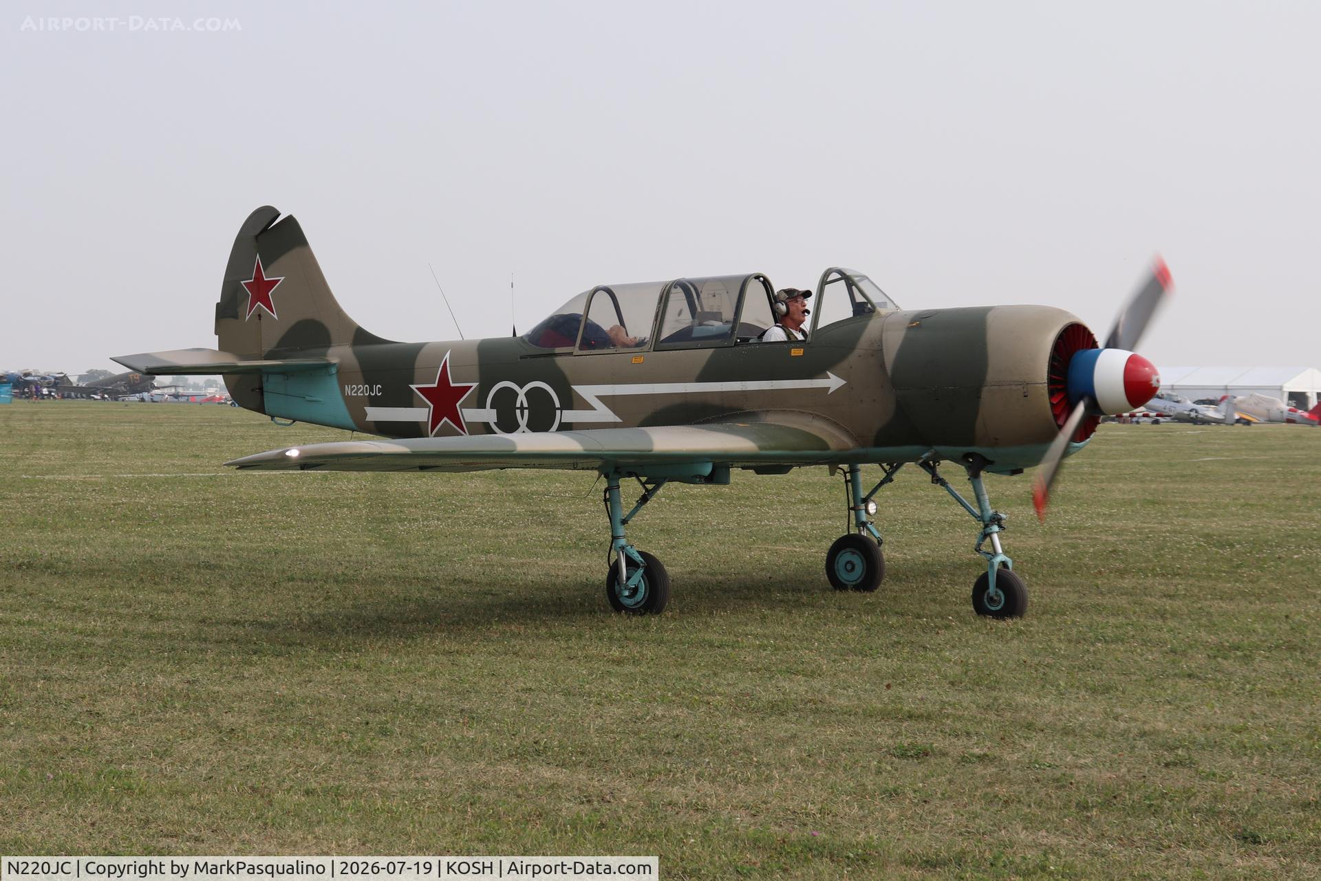 Aircraft N220JC, 1982 Yakovlev Yak-52, c/n 822713, Yakovlev Yak-52, at KOSH, photo by MarkPasqualino