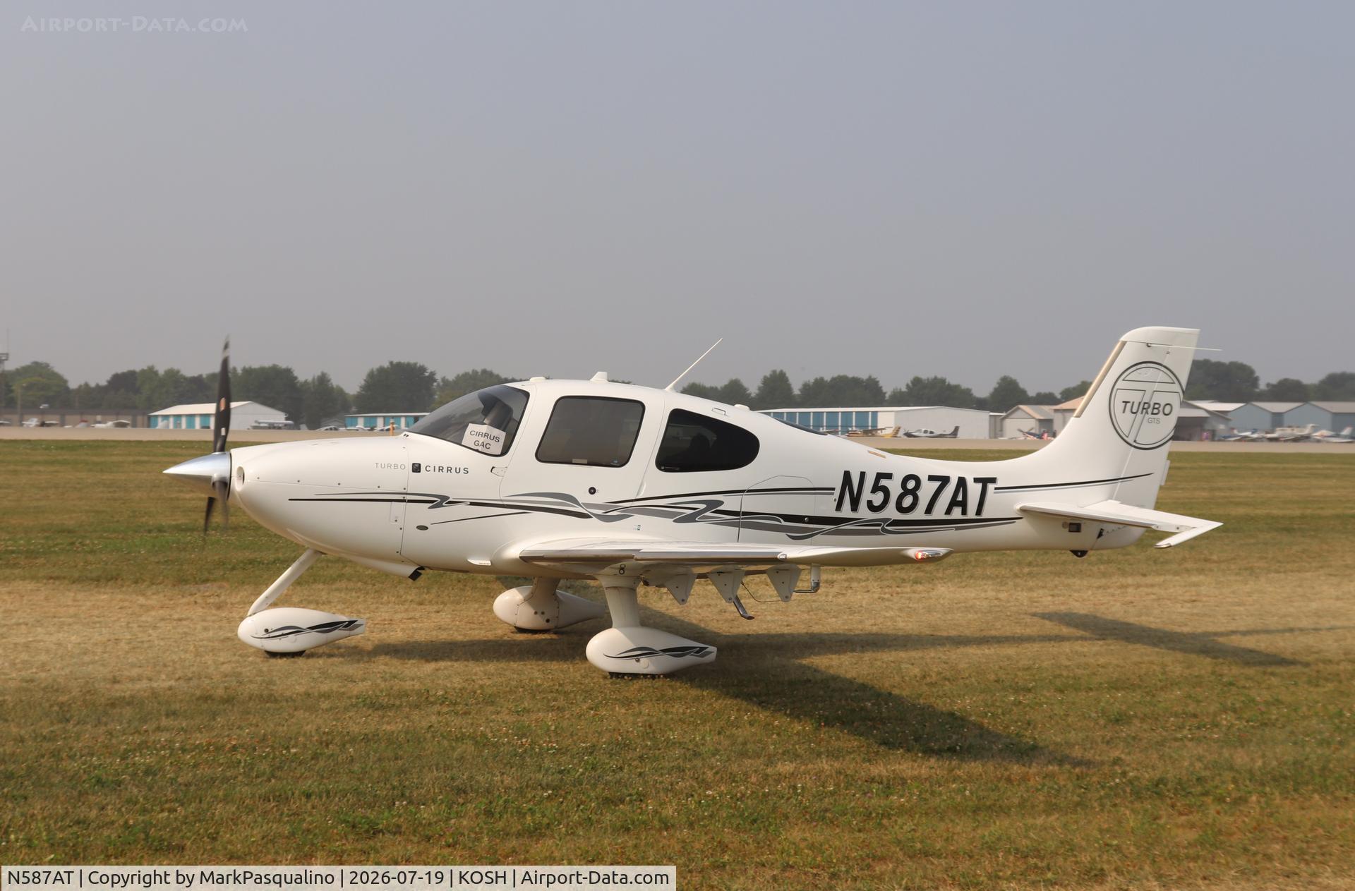 Aircraft N587AT, Cirrus SR22, c/n 3459, Cirrus SR22, at KOSH, photo by MarkPasqualino