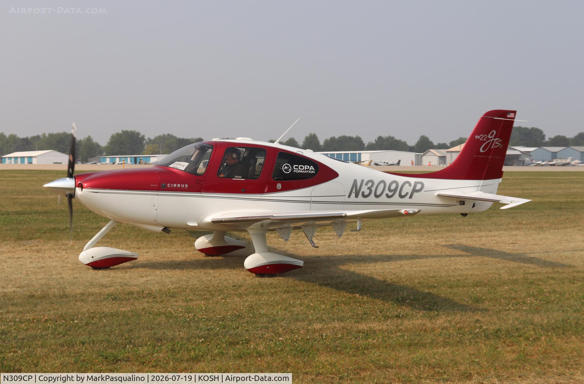Aircraft N309CP, 2008 Cirrus SR22, c/n 3232, Cirrus SR22, at KOSH, photo by MarkPasqualino