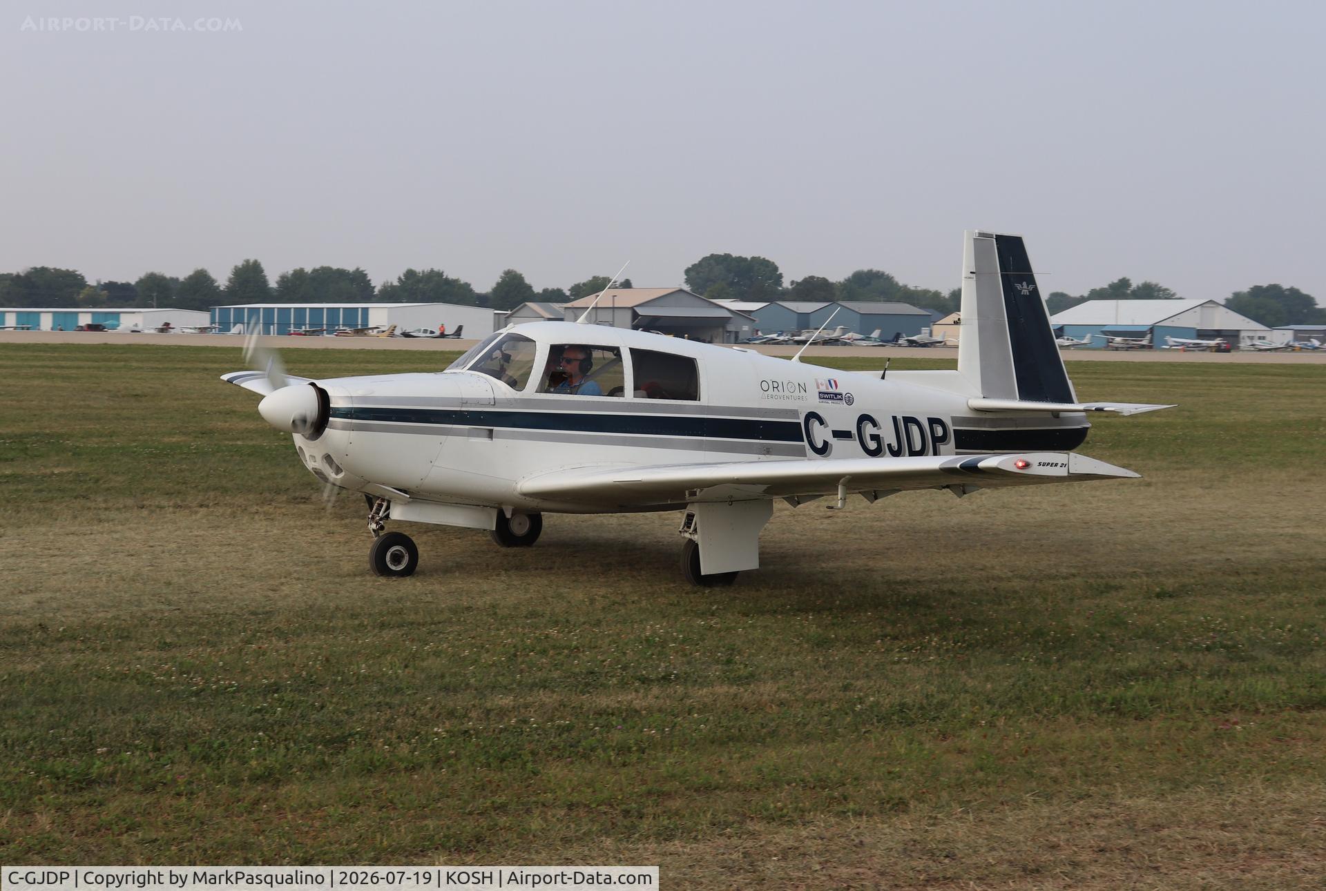 Aircraft C-GJDP, 1965 Mooney M20E, c/n 748, Mooney M20E, at KOSH, photo by MarkPasqualino