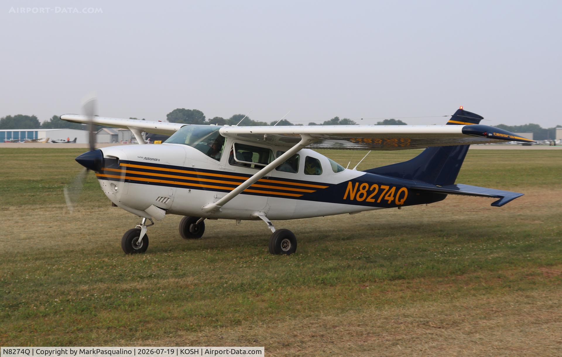 Aircraft N8274Q, 1976 Cessna TU206F Turbo Stationair, c/n U20603135, Cessna TU206F, at KOSH, photo by MarkPasqualino