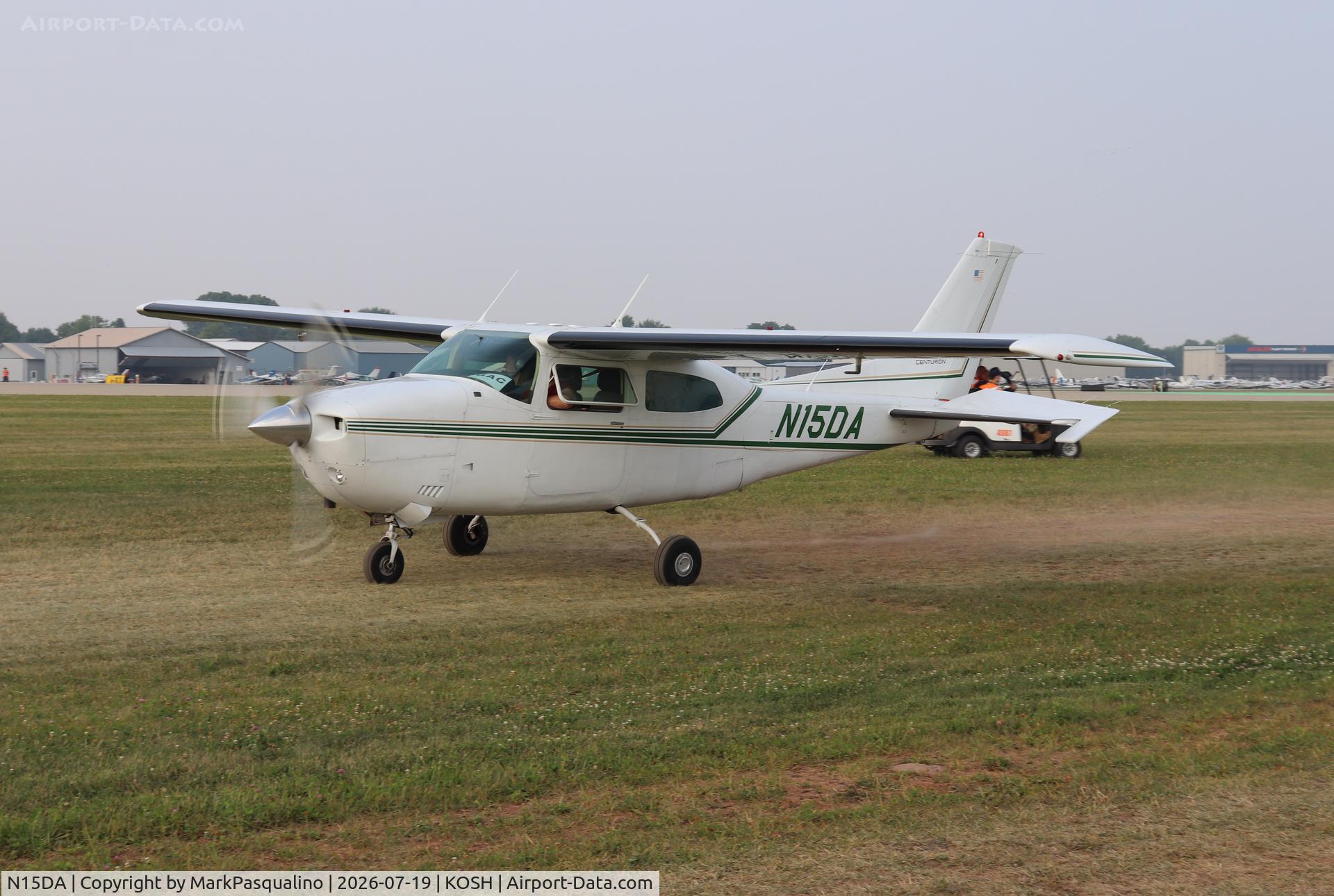 Aircraft N15DA, Cessna T210M Turbo Centurion, c/n 21061765, Cessna T210M, at KOSH, photo by MarkPasqualino