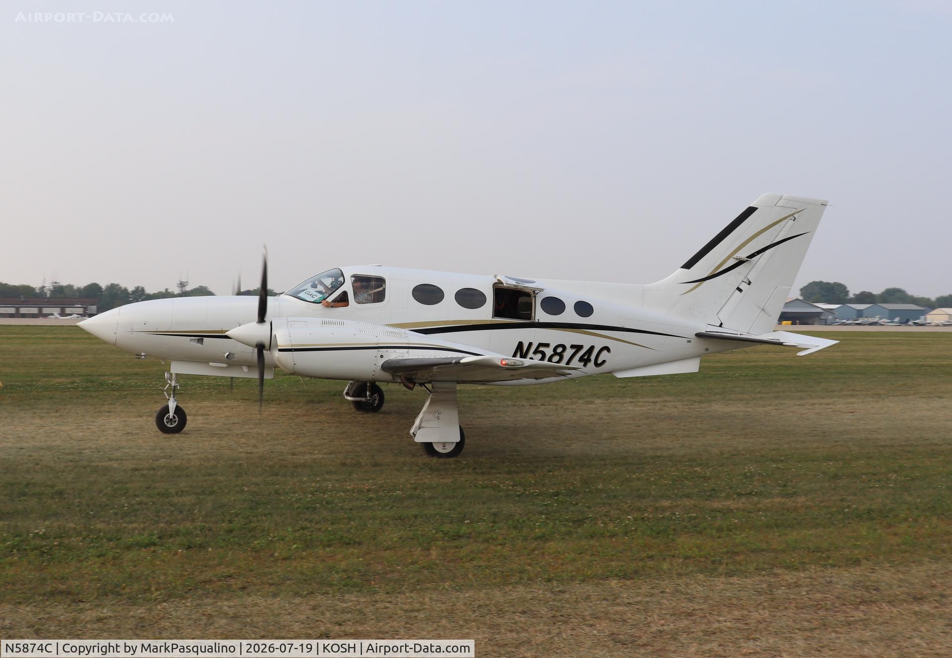 Aircraft N5874C, Cessna 421C Golden Eagle, c/n 421C0882, Cessna 421C, at KOSH, photo by MarkPasqualino