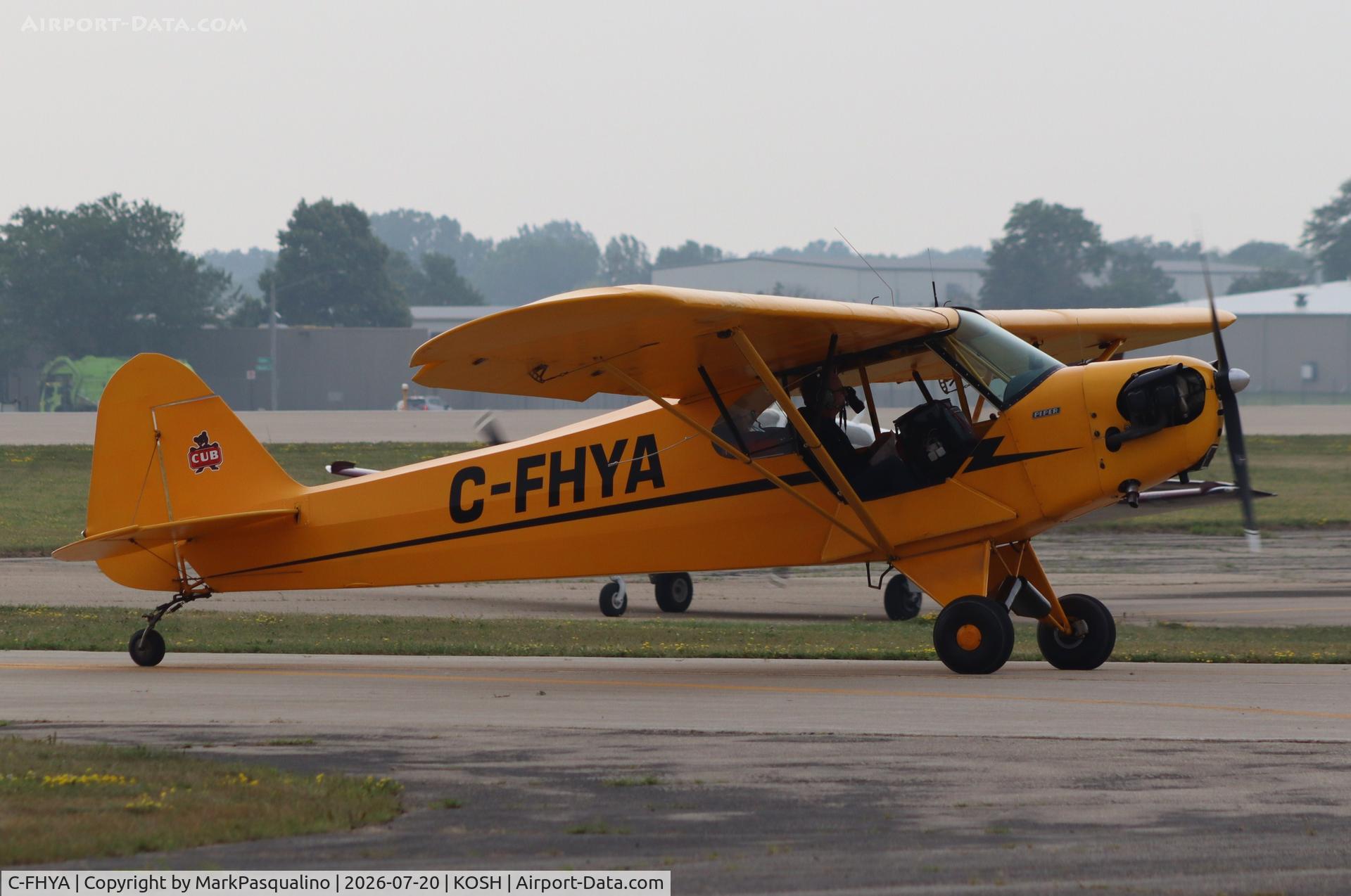 Aircraft C-FHYA, 1946 Piper J3C-65 Cub, c/n 8502, Piper J3C-65, at KOSH, photo by MarkPasqualino