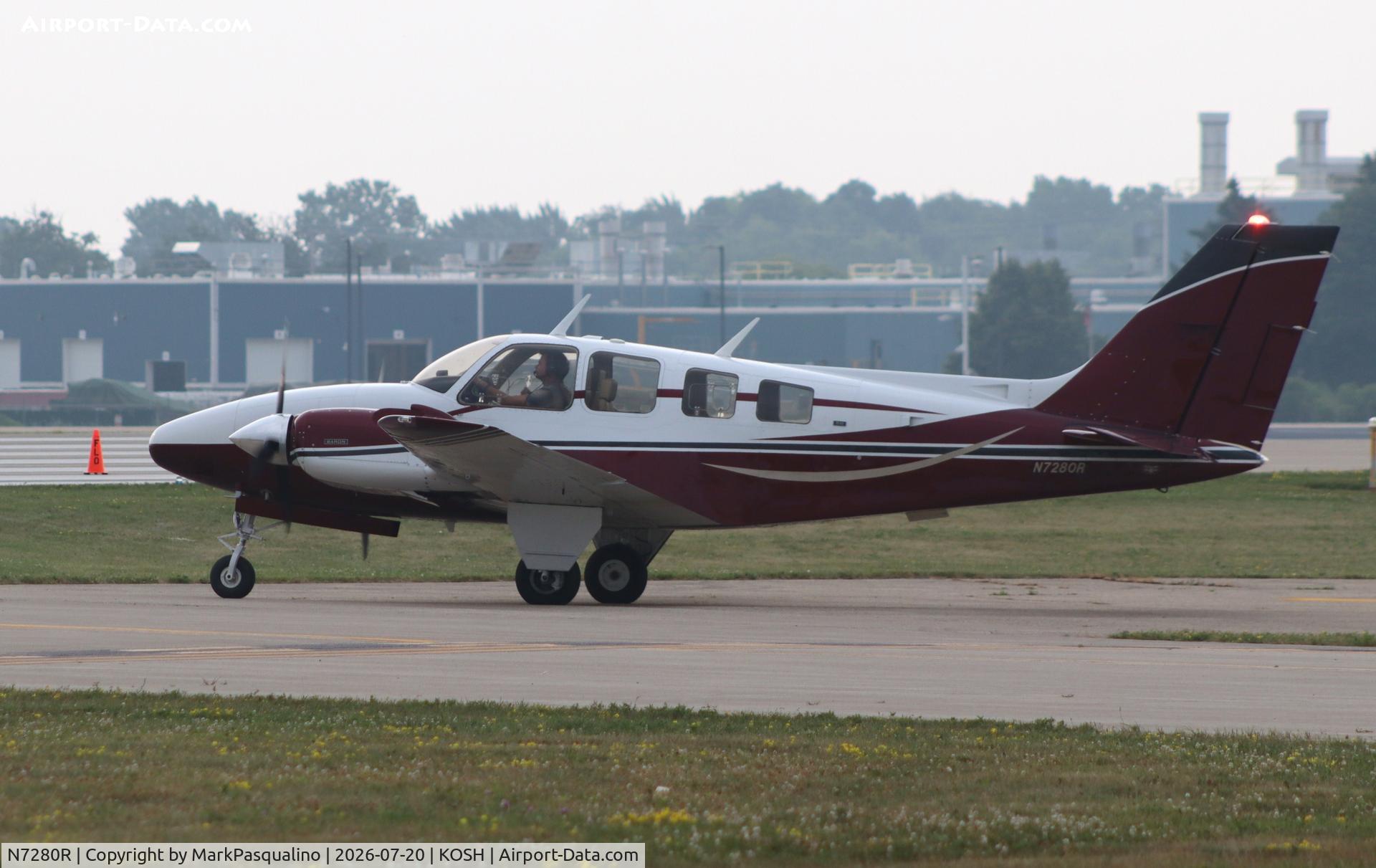 Aircraft N7280R, 1975 Beech 58 Baron, c/n TH-588, Beech 58, at KOSH, photo by MarkPasqualino