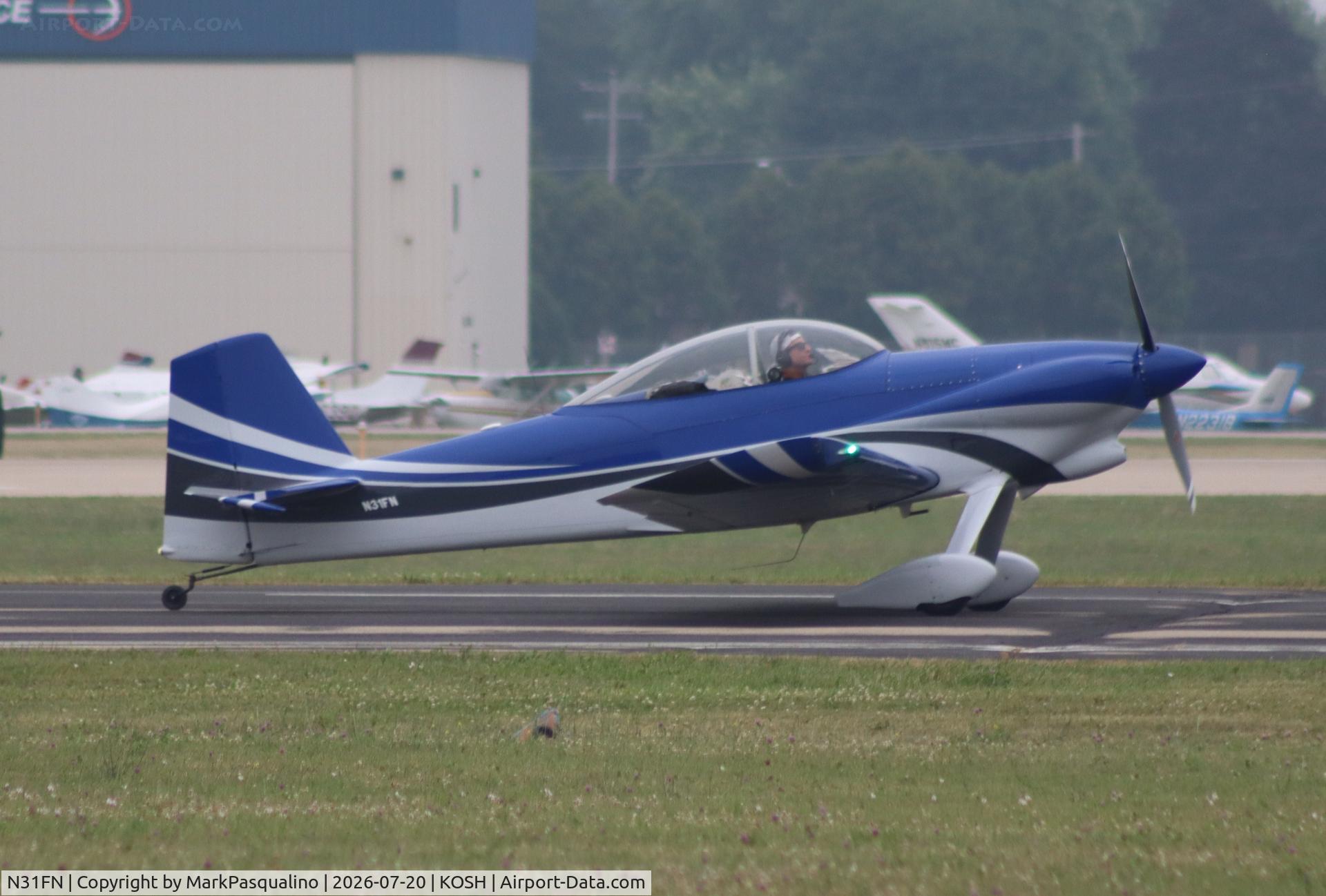 Aircraft N31FN, 1999 Robinson James VANS ACFT RV-4, c/n 1222, Vans RV-4, at KOSH, photo by MarkPasqualino