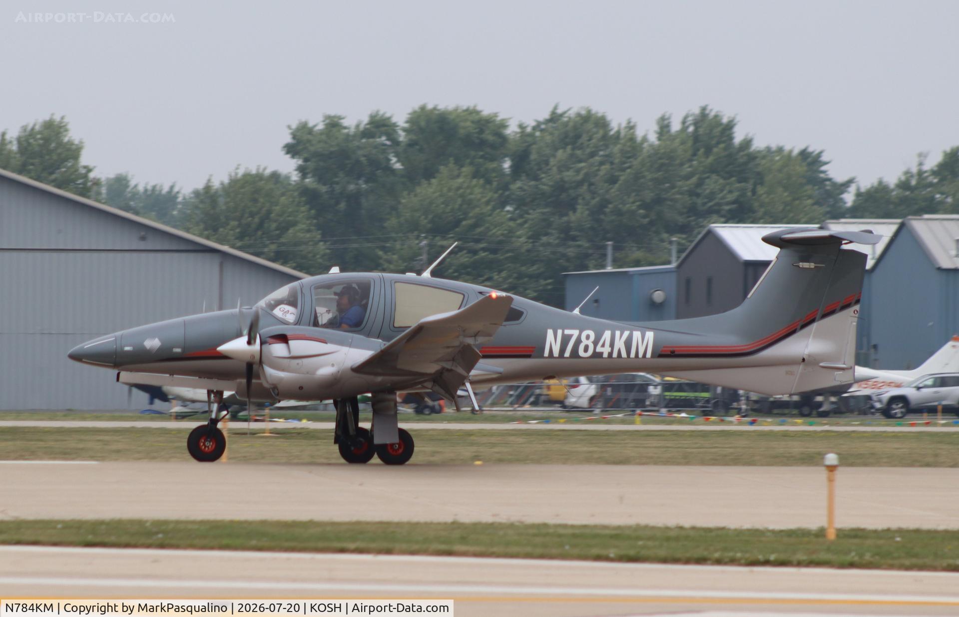Aircraft N784KM, 2020 Diamond DA 62, c/n 62.C027, Diamond DA 62, at KOSH, photo by MarkPasqualino
