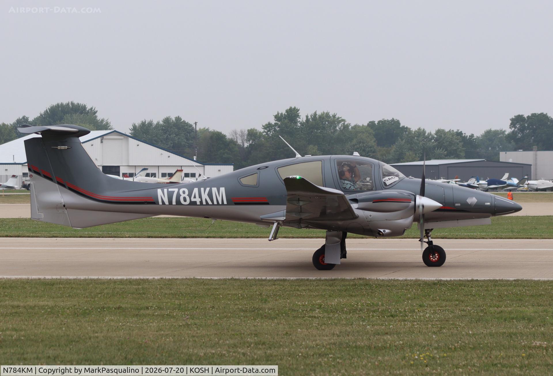 Aircraft N784KM, 2020 Diamond DA 62, c/n 62.C027, Diamond DA 62, at KOSH, photo by MarkPasqualino