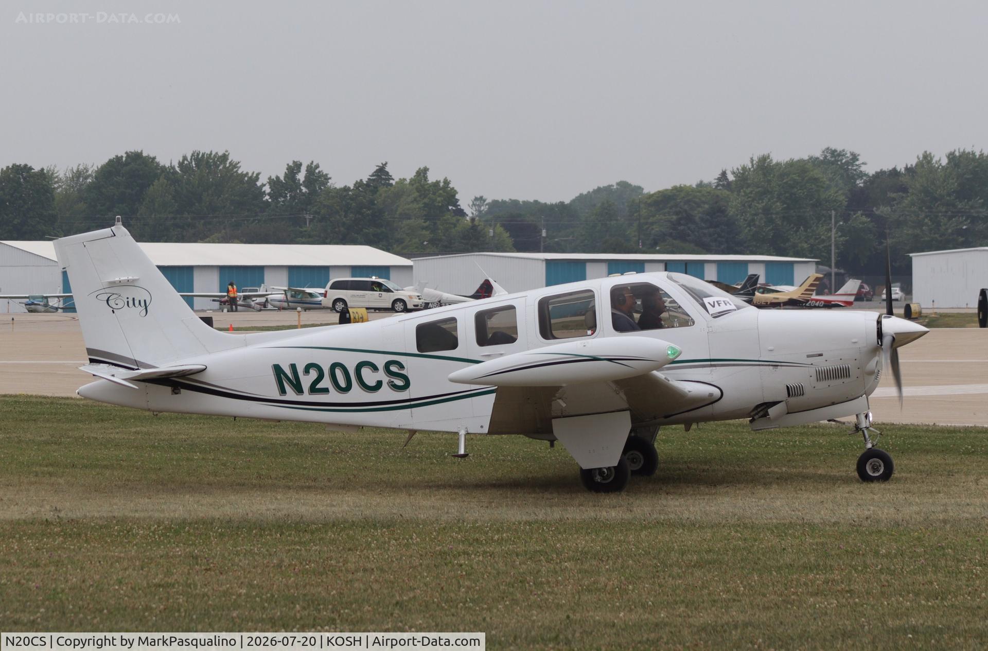Aircraft N20CS, Raytheon Aircraft Company A36 Bonanza, c/n E-3601, Beech A36, at KOSH, photo by MarkPasqualino
