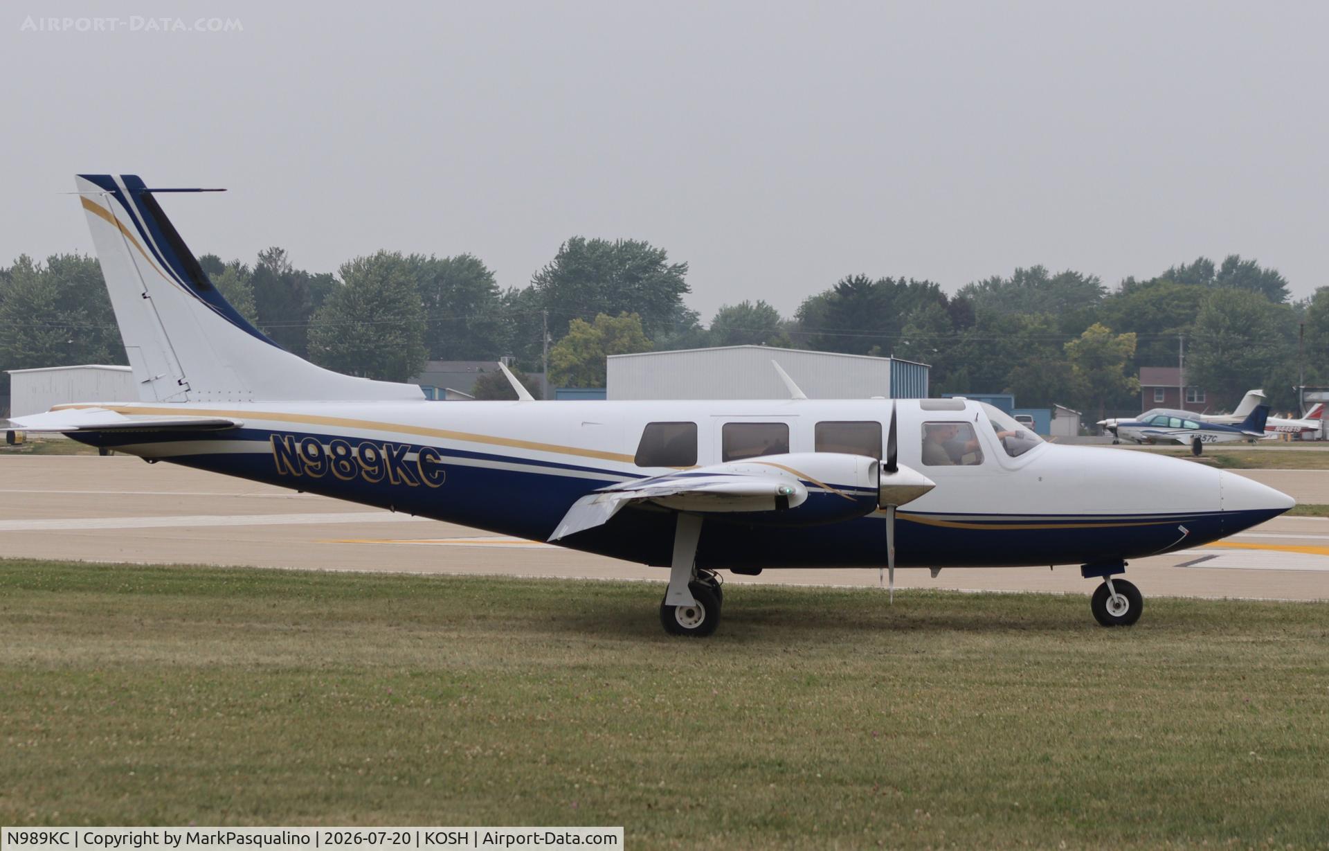 Aircraft N989KC, Smith Aerostar 600P, c/n 61P0287067, Aerostar 600P, at KOSH, photo by MarkPasqualino