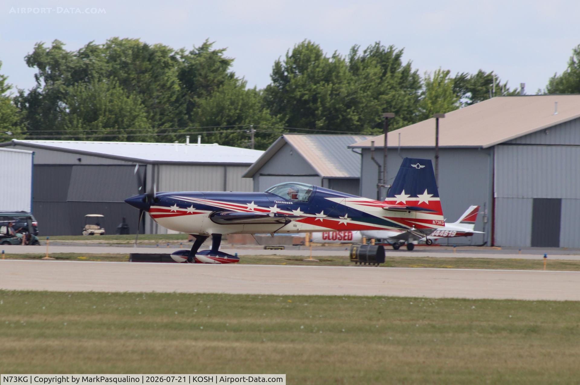 Aircraft N73KG, Extra EA-330SC, c/n SC014E, Extra EA-330SC, at KOSH, photo by MarkPasqualino