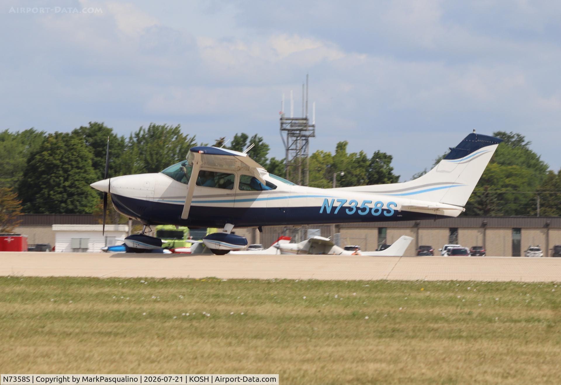 Aircraft N7358S, 1976 Cessna 182P Skylane, c/n 18265149, Cessna 182P, at KOSH, photo by MarkPasqualino