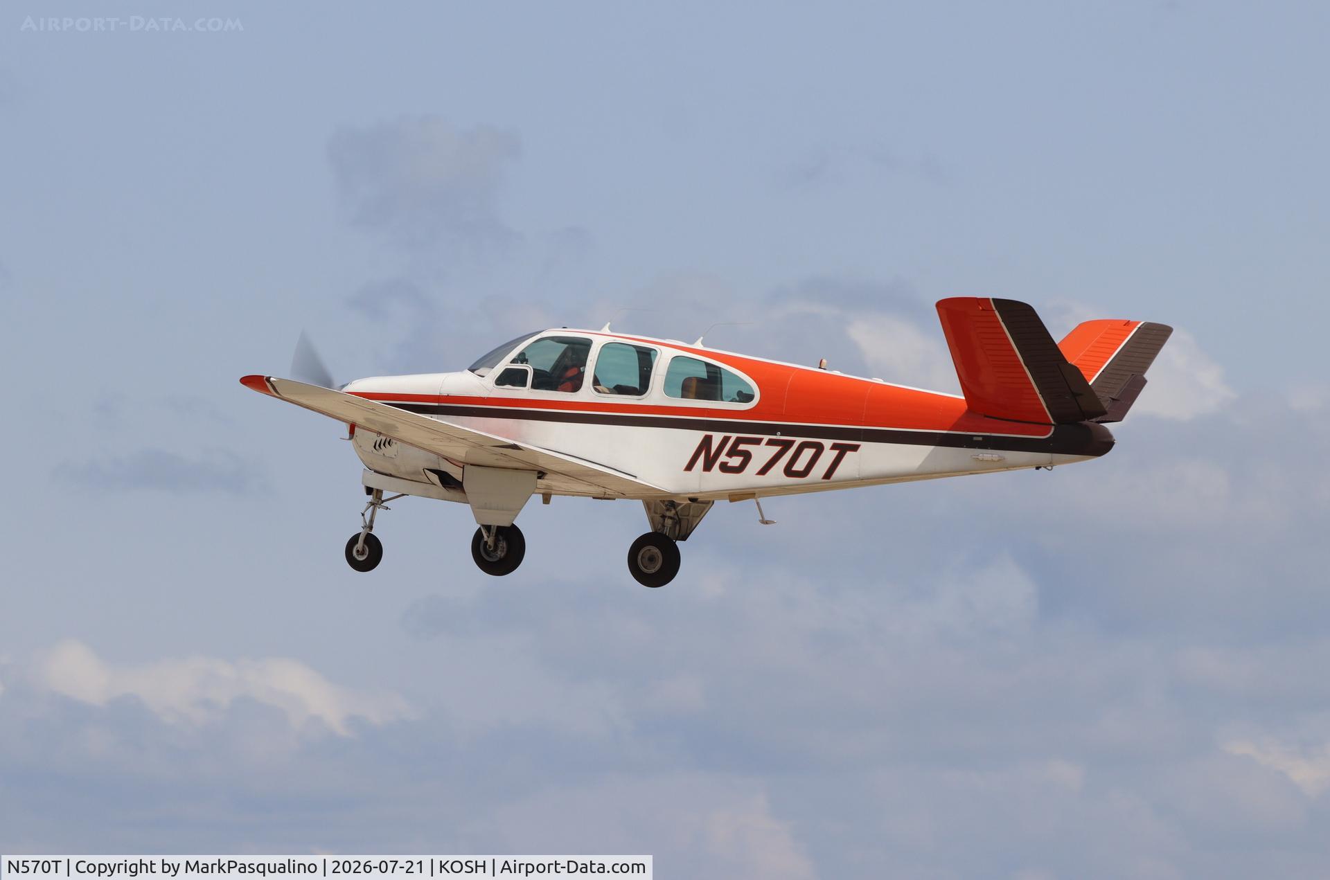 Aircraft N570T, 1961 Beech N35 Bonanza, c/n D-6747, Beech N35, at KOSH, photo by MarkPasqualino