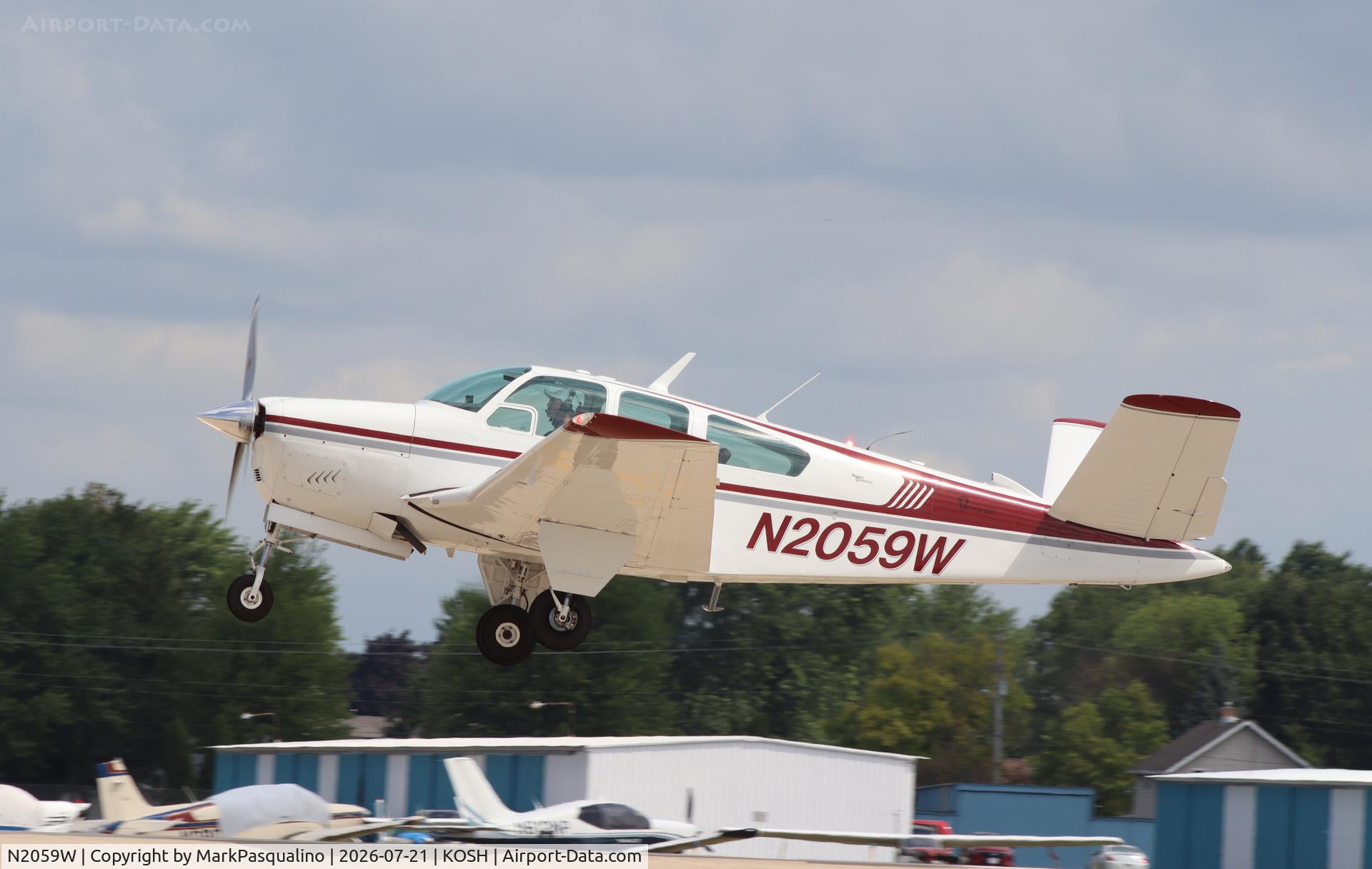 Aircraft N2059W, 1965 Beech V35 Bonanza, c/n D-7993, Beech V35, at KOSH, photo by MarkPasqualino