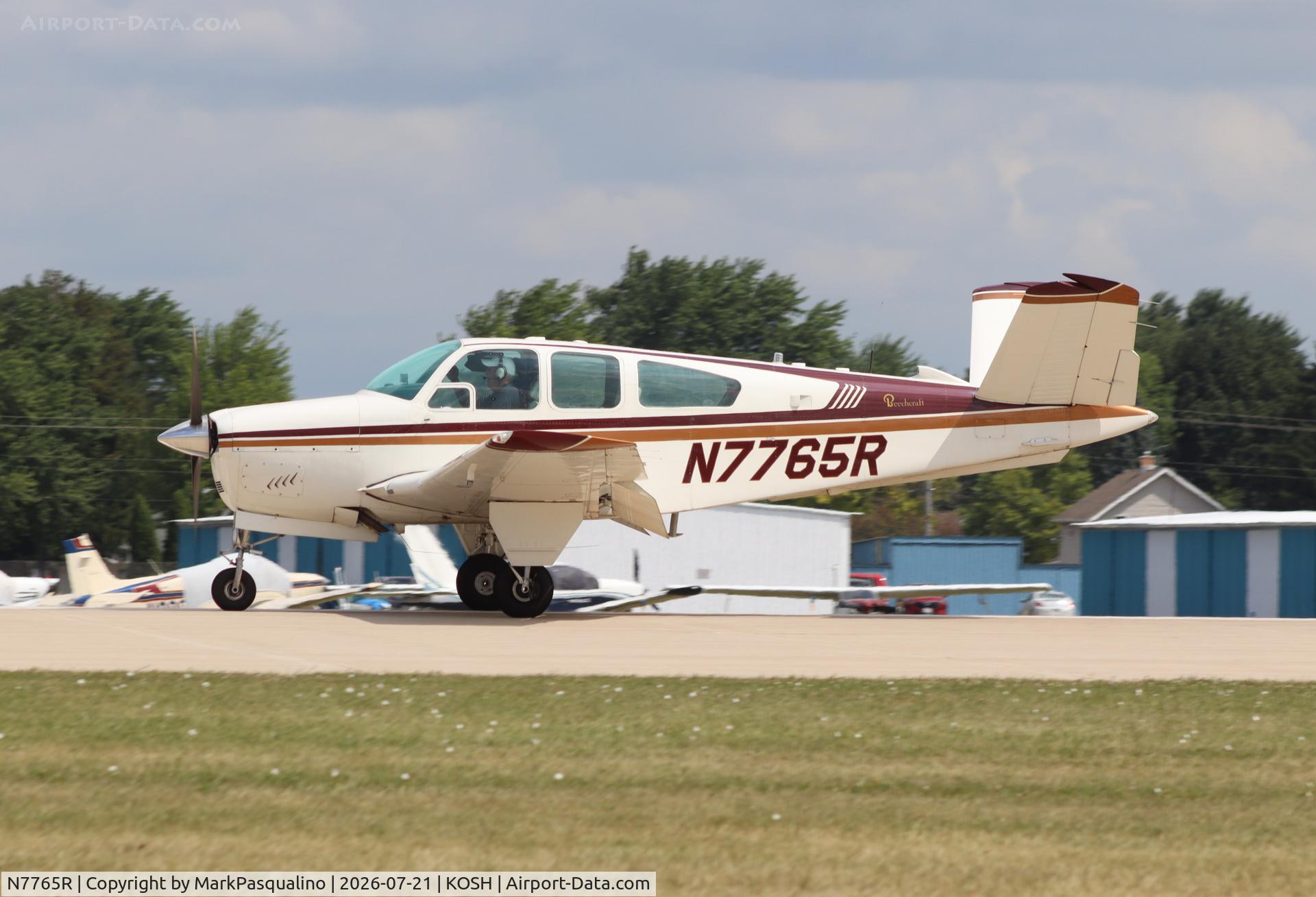 Aircraft N7765R, 1968 Beech V35A Bonanza, c/n D-8882, Beech V35A, at KOSH, photo by MarkPasqualino