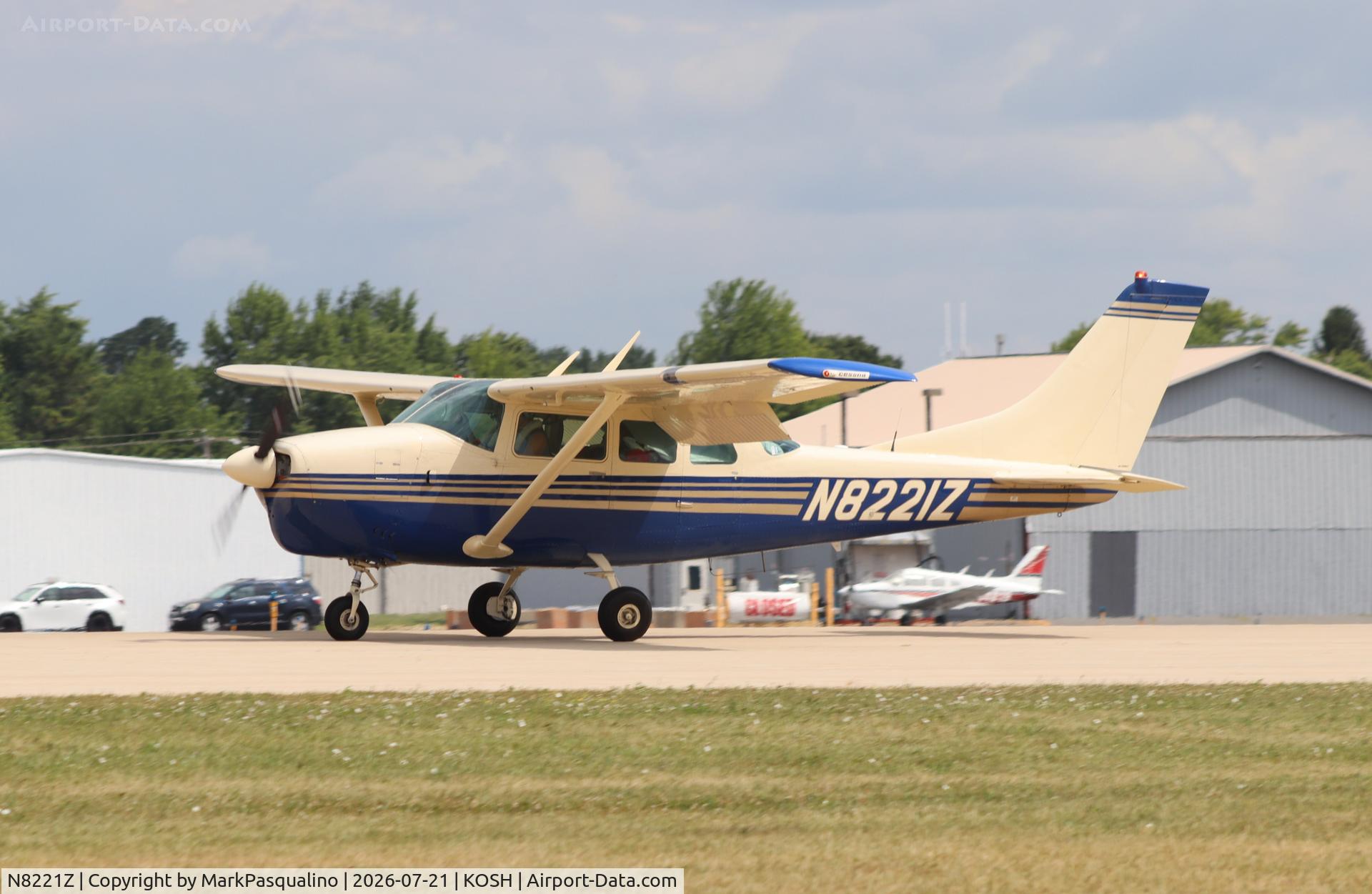 Aircraft N8221Z, 1963 Cessna 210-5(205), c/n 205-0221, Cessna 205, at KOSH, photo by MarkPasqualino