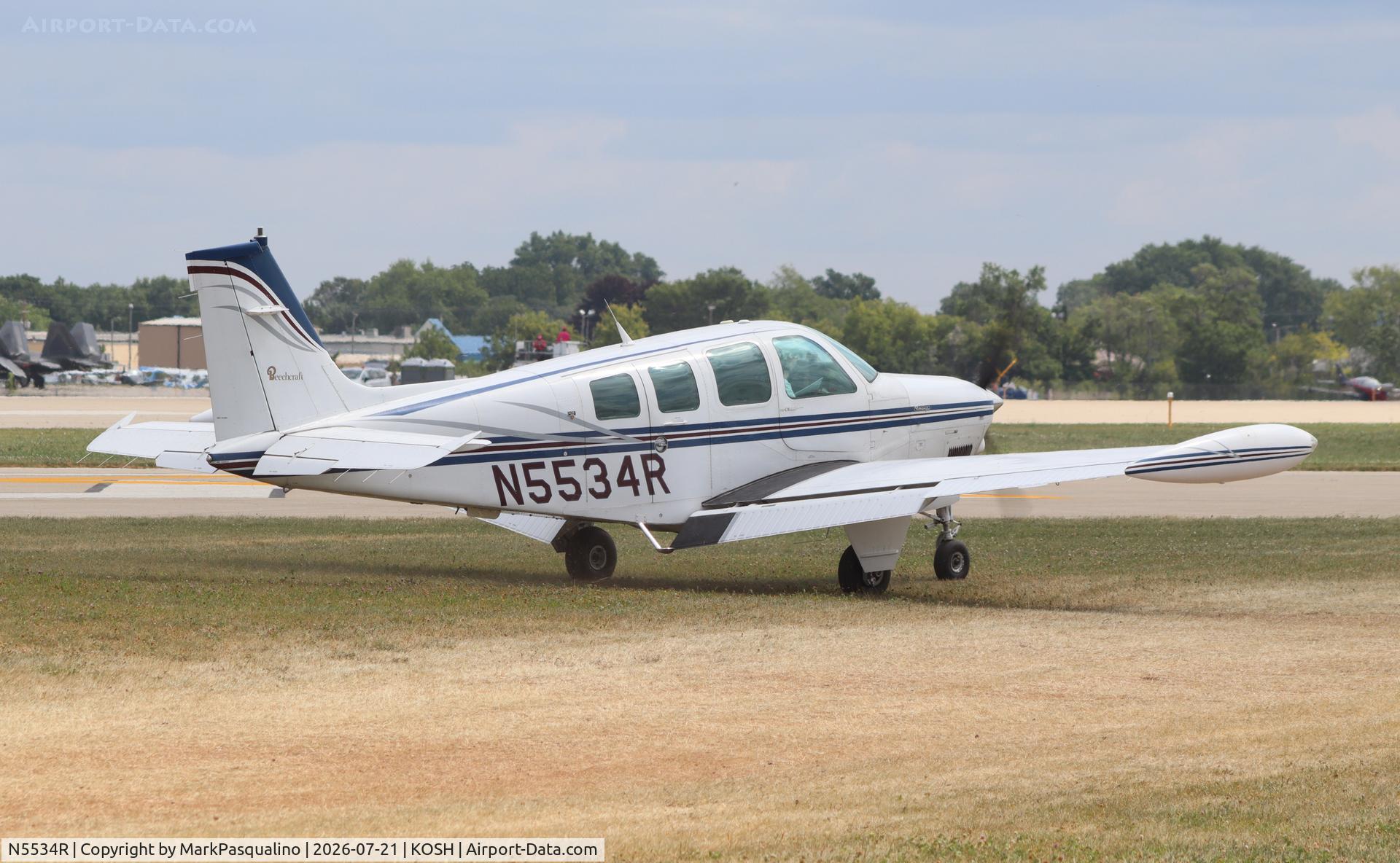 Aircraft N5534R, 1990 Beech A36 Bonanza 36, c/n E-2576, Beech A36, at KOSH, photo by MarkPasqualino