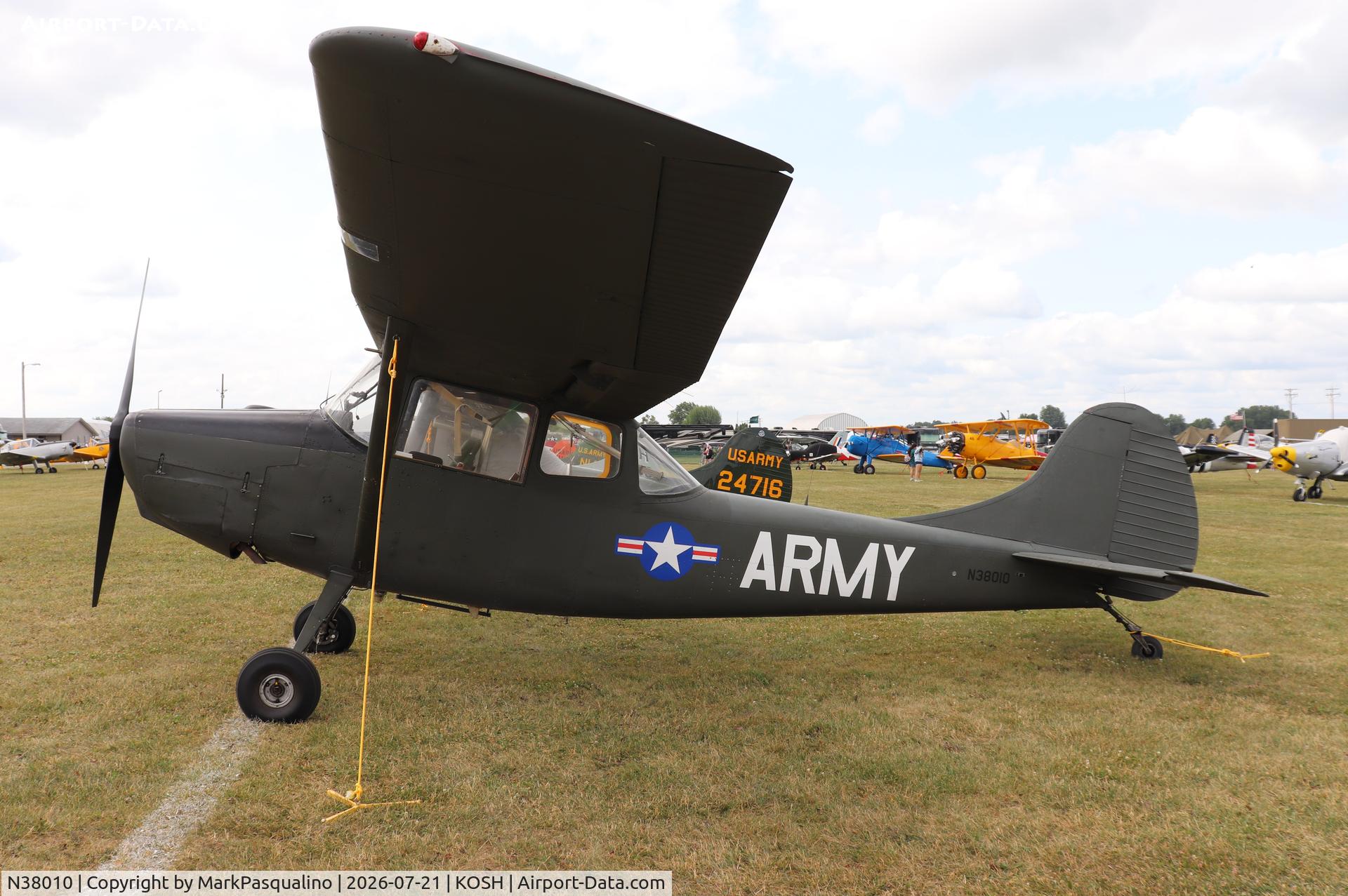 Aircraft N38010, Cessna 305A, c/n 22644, Cessna 305A, at KOSH, photo by MarkPasqualino