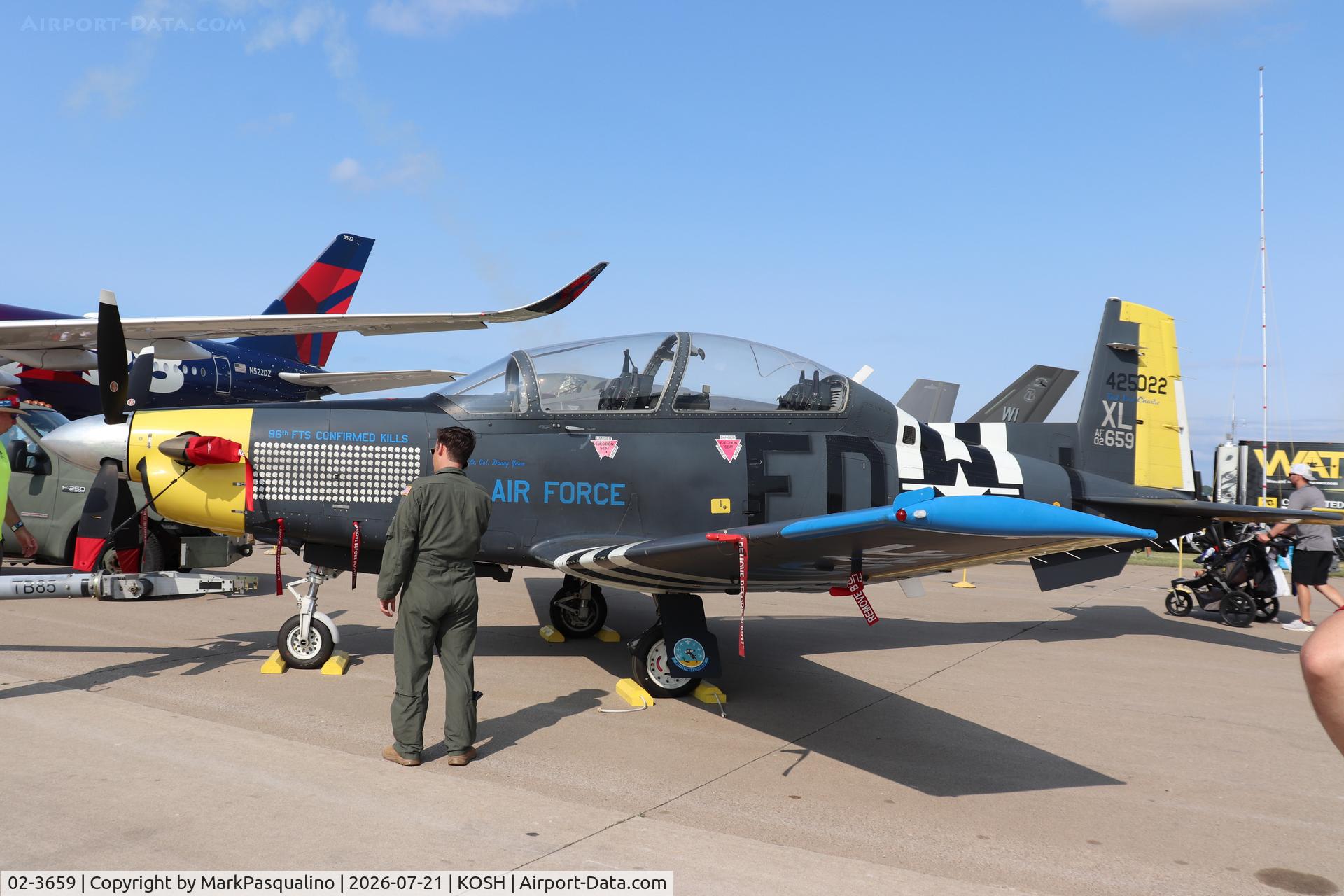 Aircraft 02-3659, 2002 Raytheon T-6A Texan II, c/n PT-201, Raytheon T-6A Texan II, at KOSH, photo by MarkPasqualino