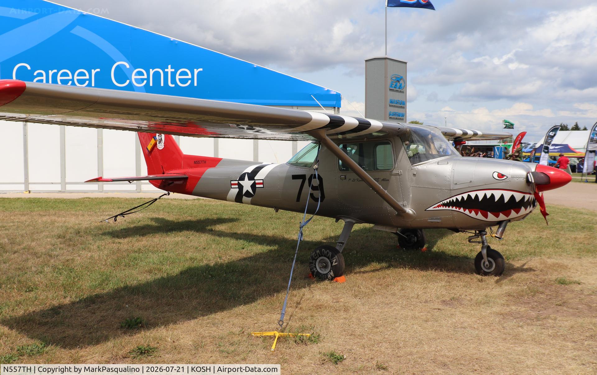 Aircraft N557TH, 1975 Cessna 150M, c/n 15077111, Cessna 150M, at KOSH, photo by MarkPasqualino