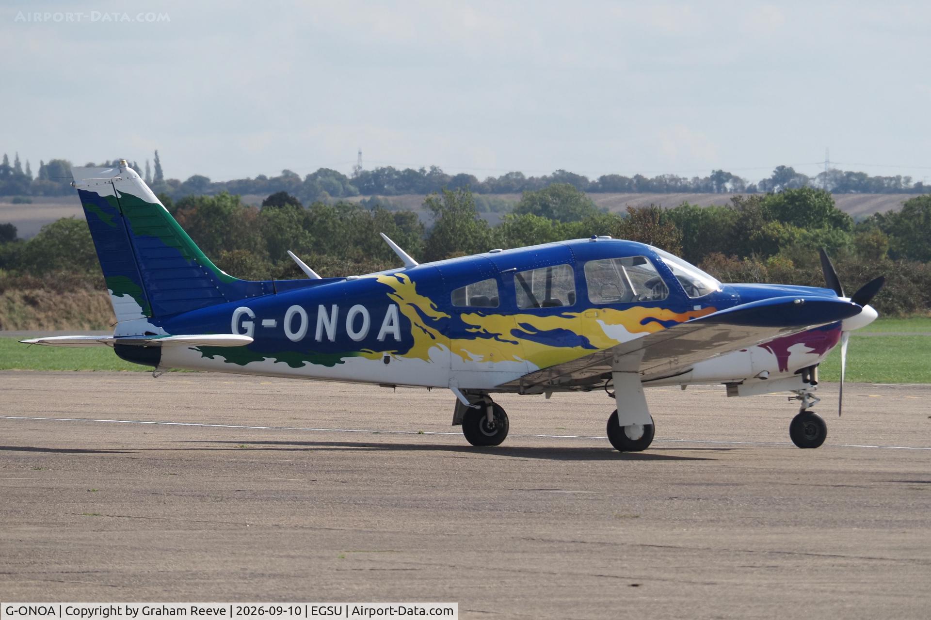 Aircraft G-ONOA, 1976 Piper Cherokee Arrow II, c/n 28R-7635372, Parked at Duxford., at EGSU, photo by Graham Reeve