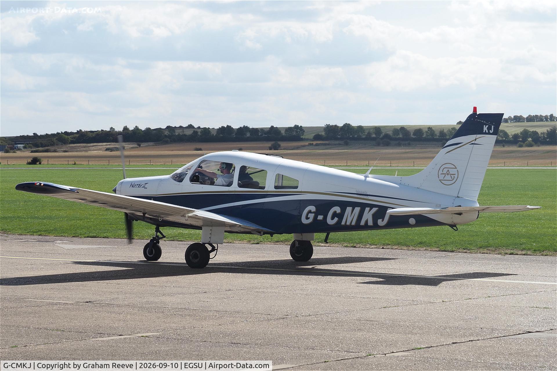Aircraft G-CMKJ, 1984 Piper PA-28-161 Cherokee Warrior II, c/n 28-8416086, Just landed at Duxford., at EGSU, photo by Graham Reeve
