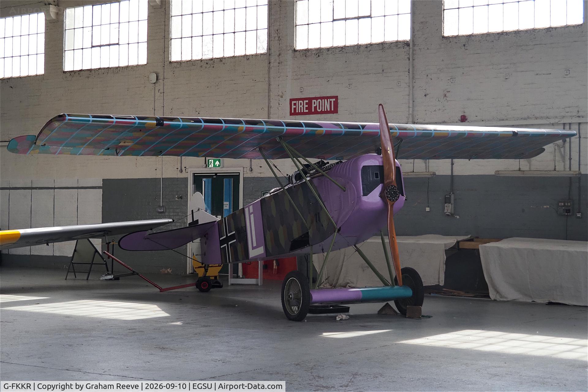 Aircraft G-FKKR, 2020 Fokker D.VII replica, c/n LAA 387-15264, On display at the IWM, Duxford, with the lower wing removed.., at EGSU, photo by Graham Reeve