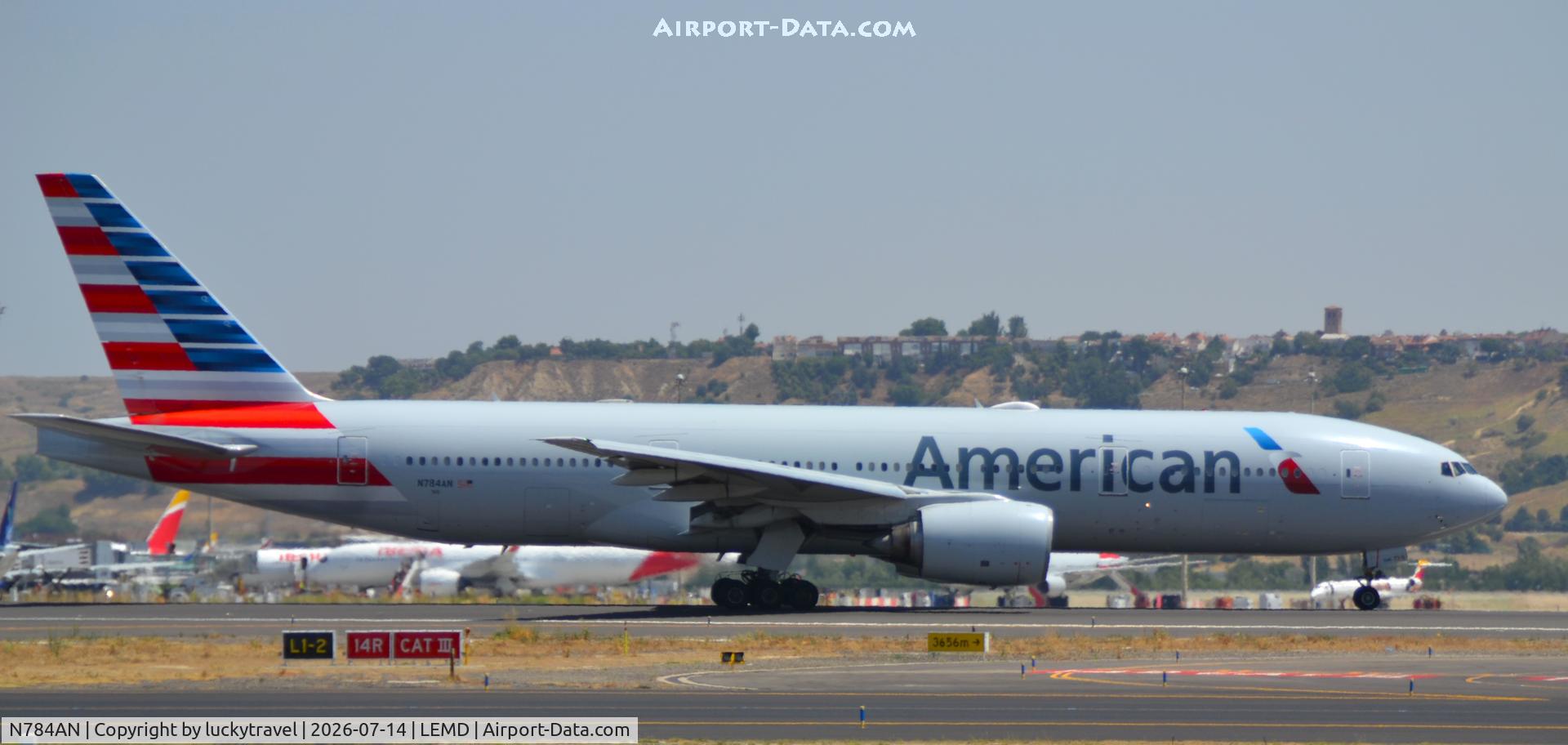 Aircraft N784AN, 2000 Boeing 777-223, c/n 29588, American B777-200 taking off from RWY32L at Madrid (LEMD), at LEMD, photo by luckytravel