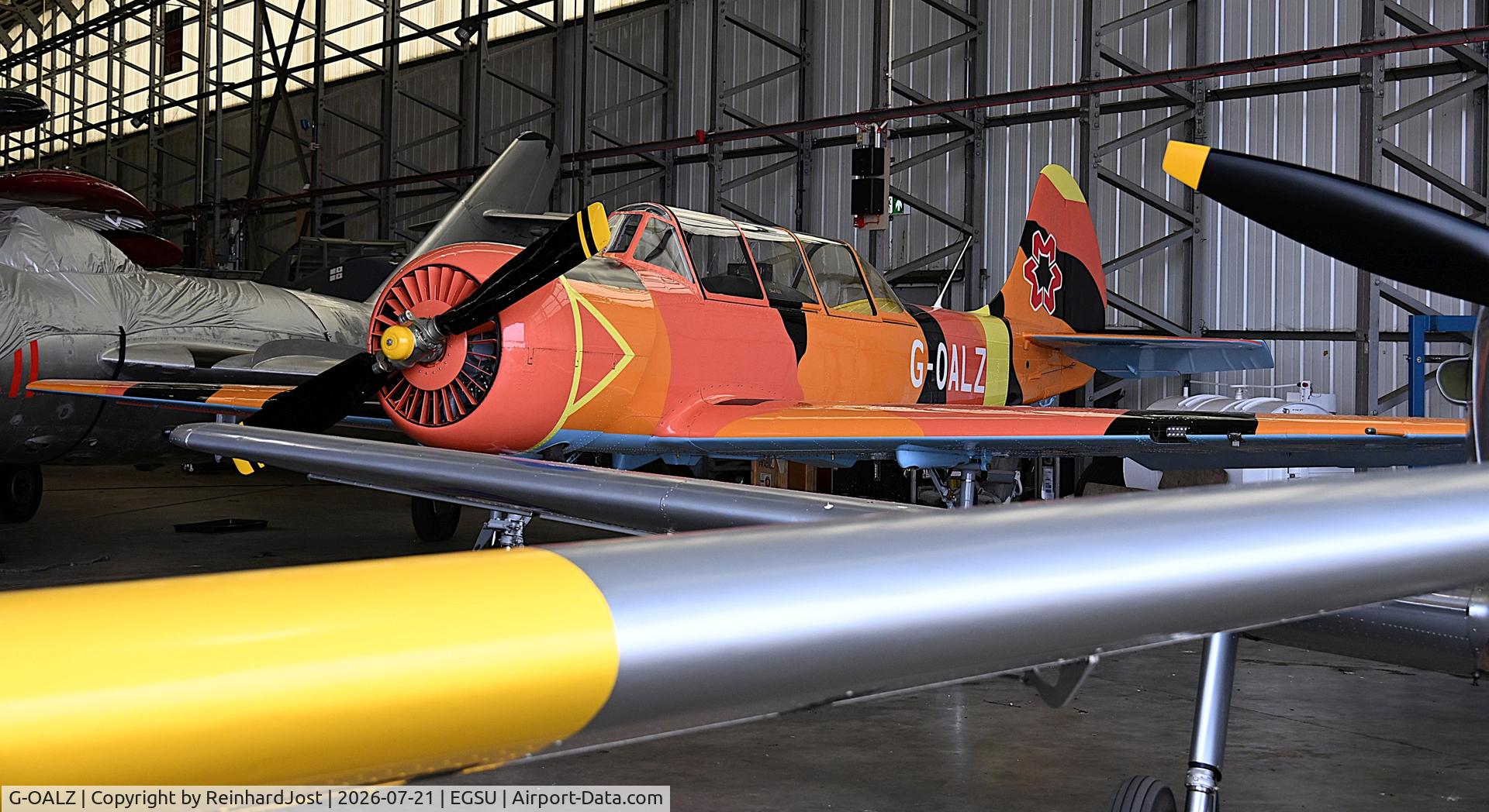 Aircraft G-OALZ, 1986 Yakovlev Yak-52, c/n 867013, G-OALZ (ex-UR-EGL) in distinctive colors at the collection at Duxford, UK, at EGSU, photo by ReinhardJost