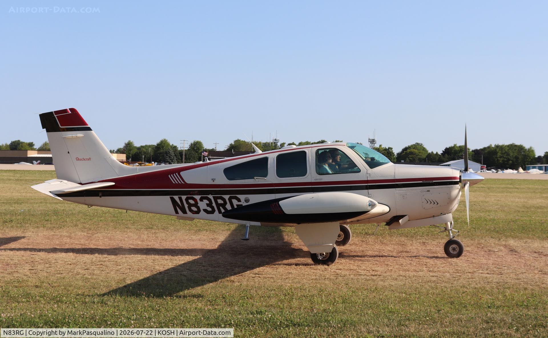 Aircraft N83RG, 1987 Beech F33A Bonanza, c/n CE-1205, Beech F33A, at KOSH, photo by MarkPasqualino