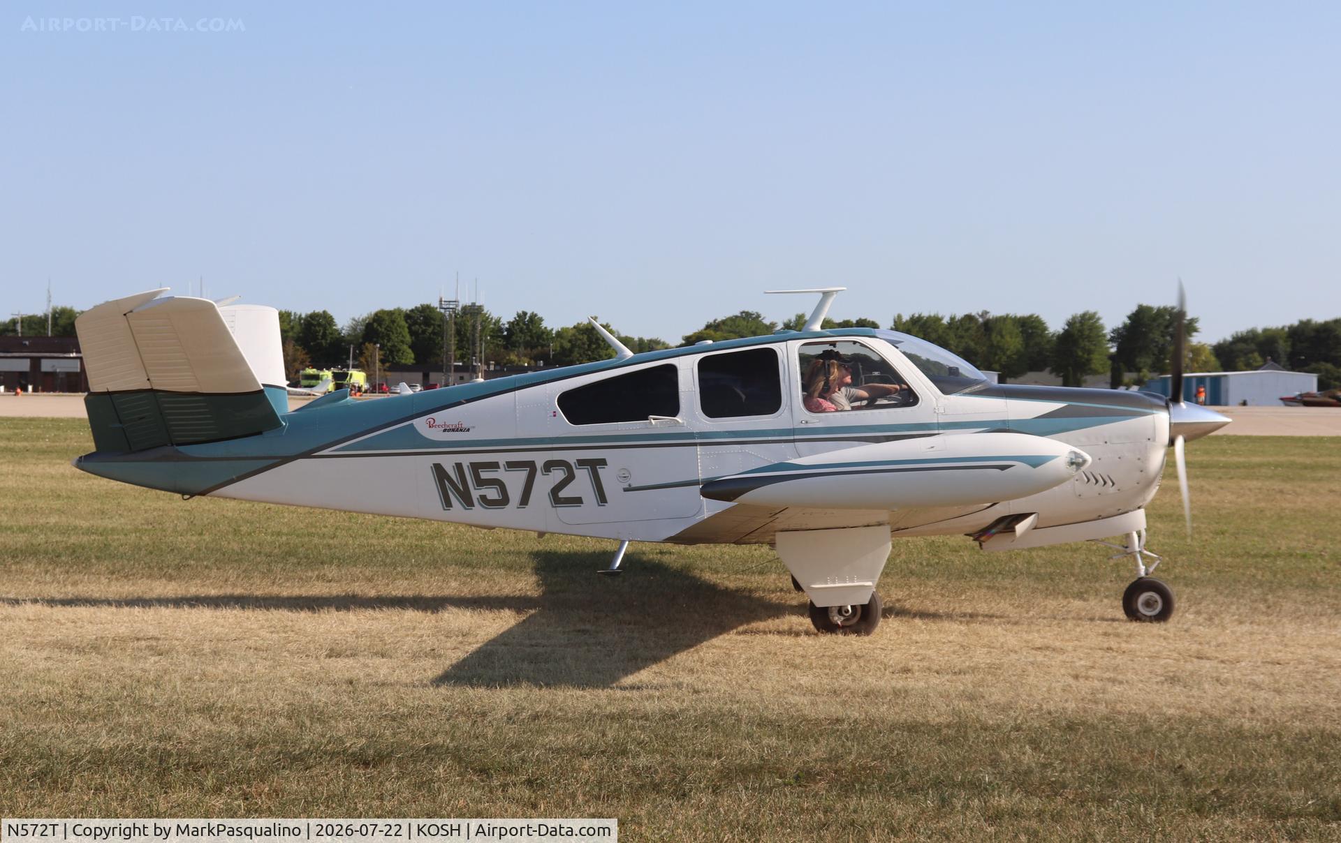 Aircraft N572T, 1964 Beech S35 Bonanza, c/n D-7400, Beech S35, at KOSH, photo by MarkPasqualino