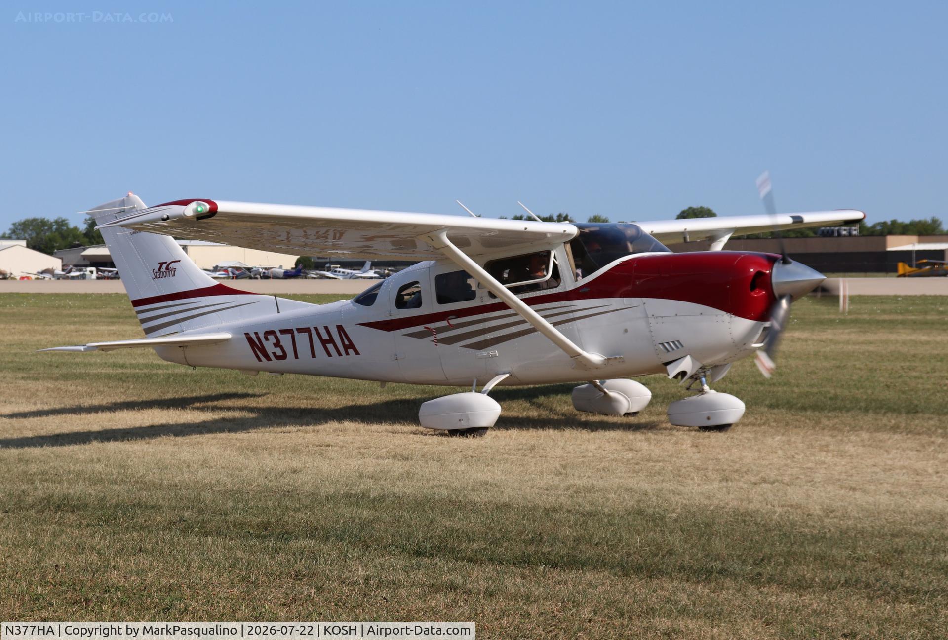 Aircraft N377HA, 2004 Cessna T206H Turbo Stationair, c/n T20608499, Cessna T206H, at KOSH, photo by MarkPasqualino