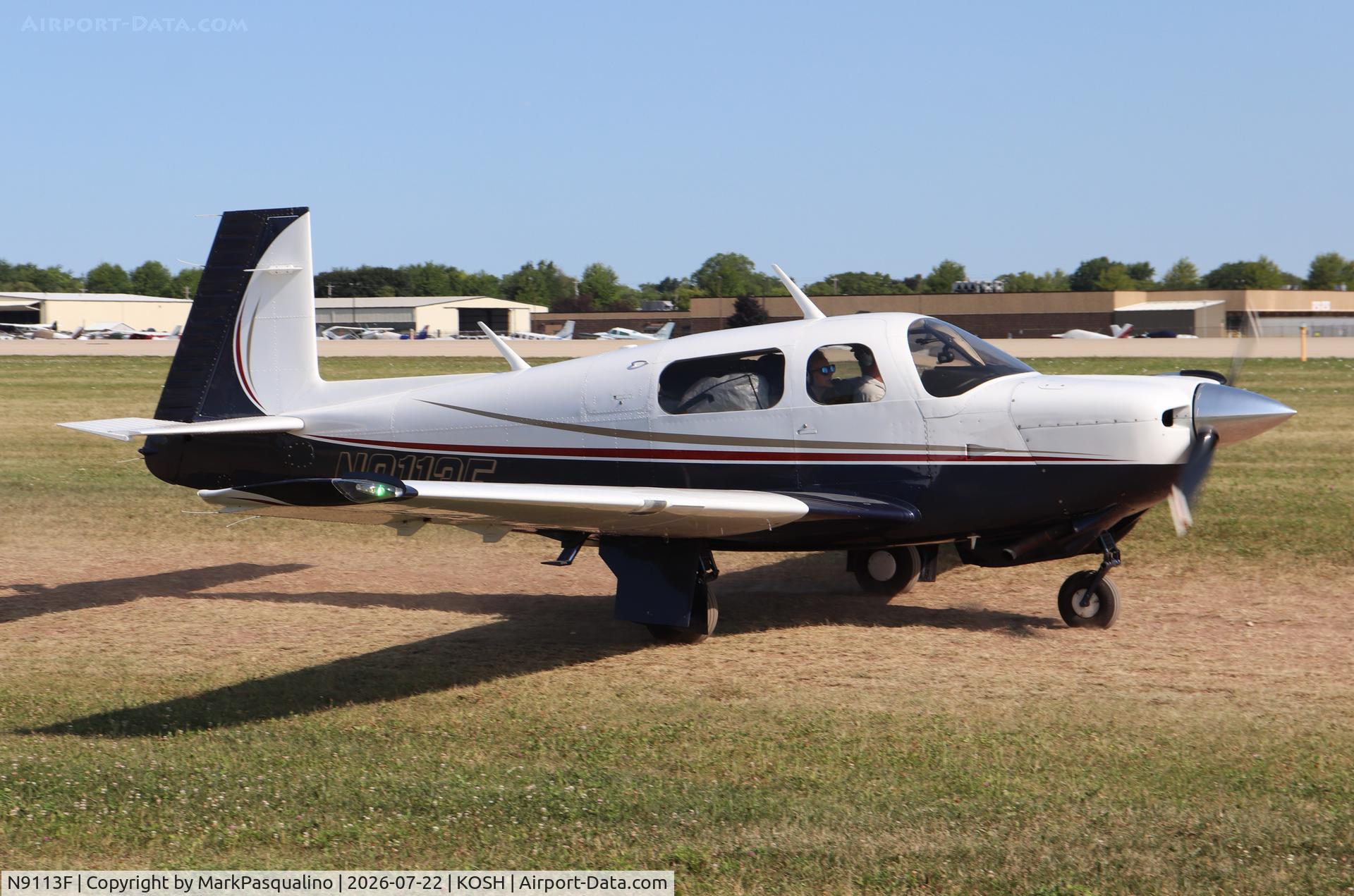 Aircraft N9113F, Mooney M20J 201, c/n 24-3180, Mooney M20J, at KOSH, photo by MarkPasqualino