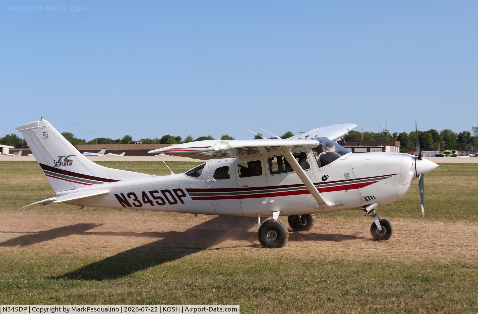 Aircraft N345DP, 2001 Cessna T206H Turbo Stationair, c/n T20608269, Cessna T206H, at KOSH, photo by MarkPasqualino