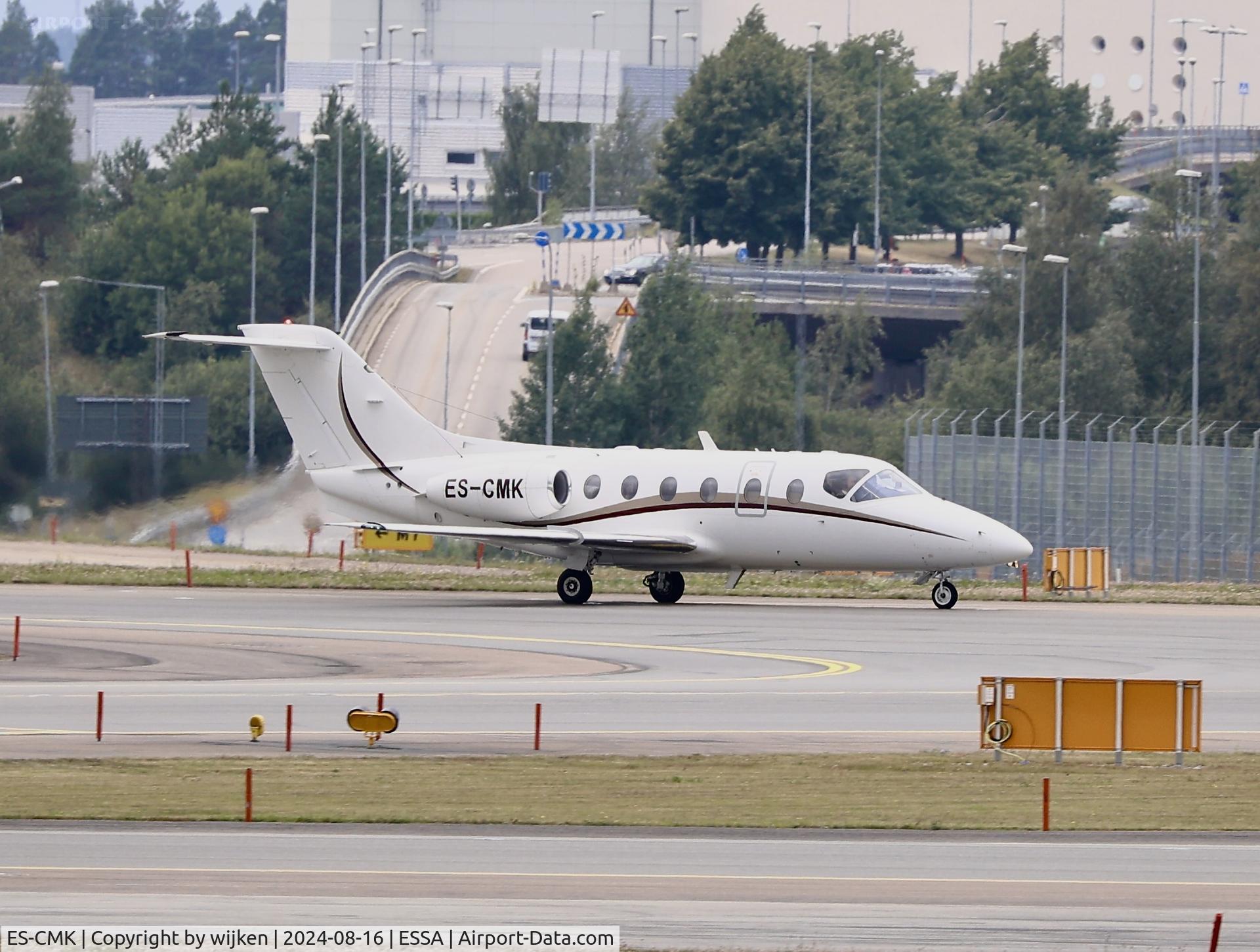 Aircraft ES-CMK, 1998 Raytheon Beechjet 400A, c/n RK-209, Twy W, at ESSA, photo by wijken