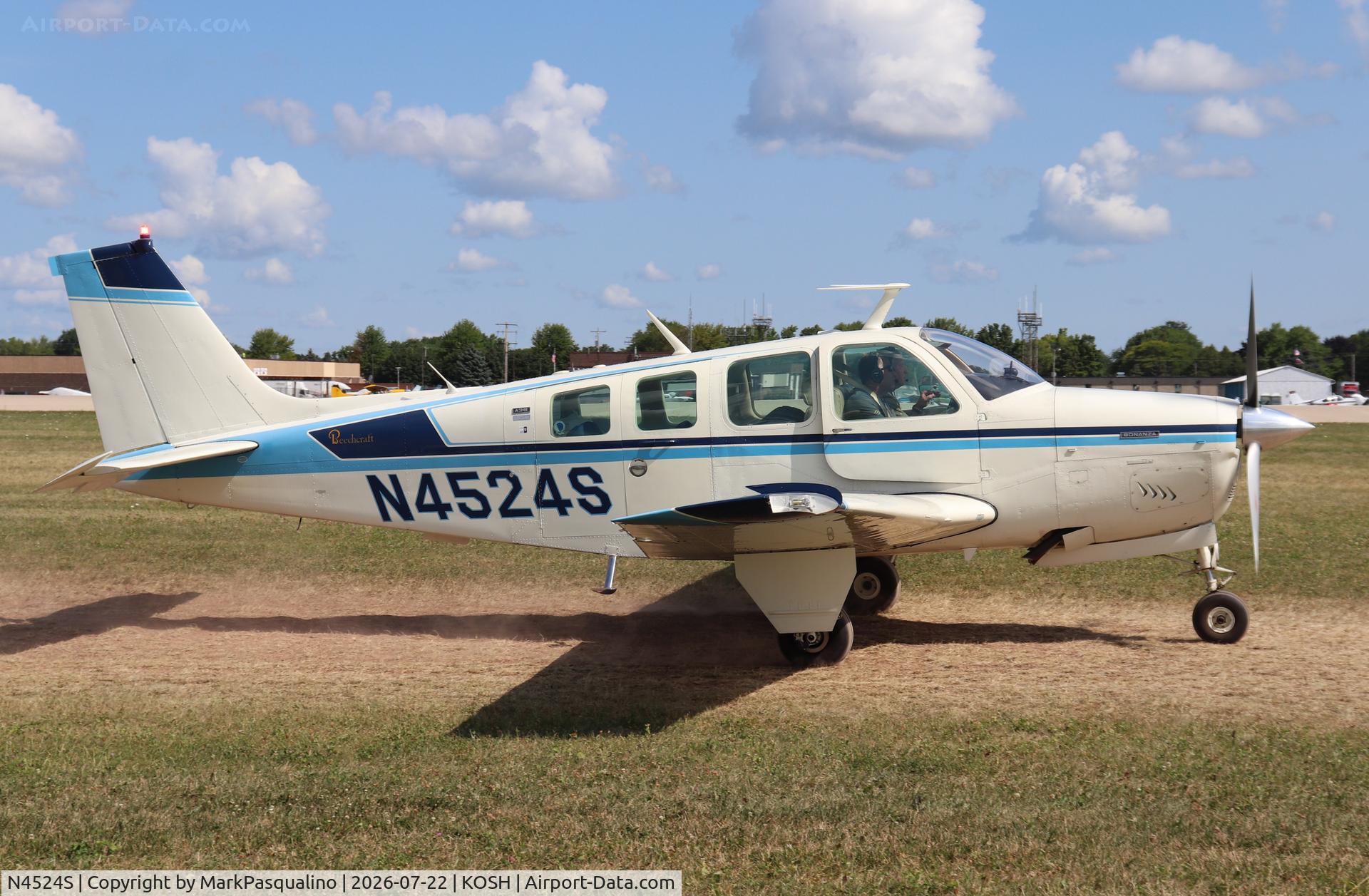 Aircraft N4524S, 1975 Beech A36 Bonanza 36, c/n E-727, Beech A36, at KOSH, photo by MarkPasqualino