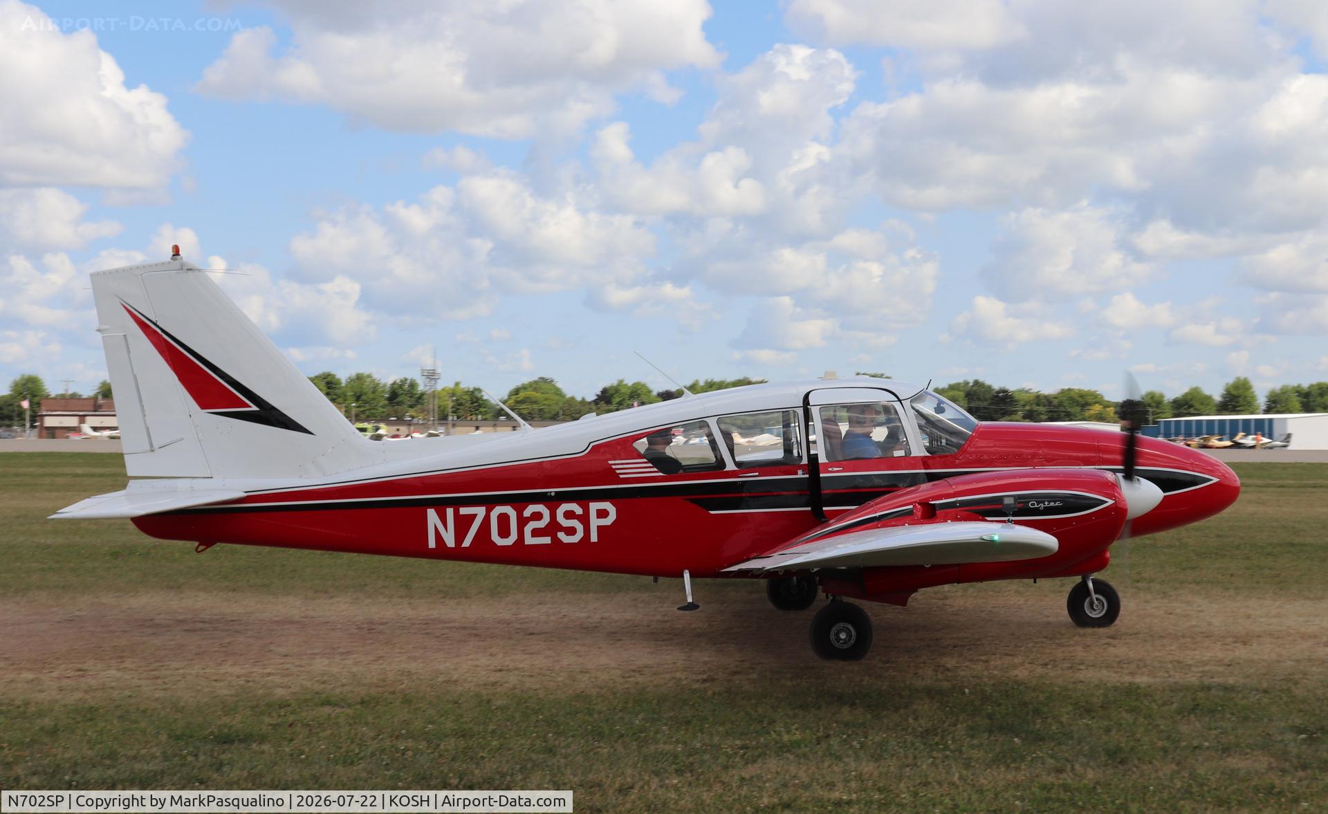 Aircraft N702SP, 1963 Piper PA-23-250, c/n 27-2336, Piper PA-23-250, at KOSH, photo by MarkPasqualino