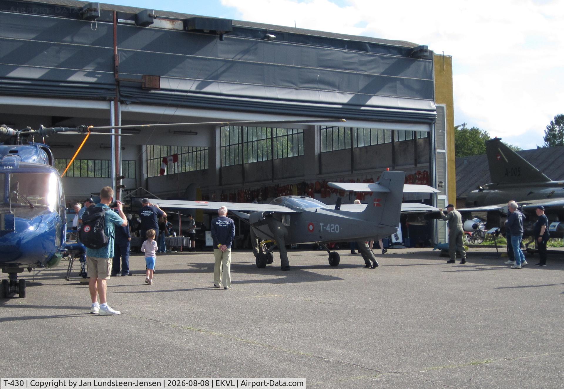 Aircraft T-430, Saab T-17 Supporter, c/n 15-230, Royal Danish Air Force Saab MFI T-17 being pushed into Hangar 2 at an airshow at the former Vaerloese Air Base in Denmark. Westland Lynx museum helicopter to the left and Saab Draken museum fighter to the right., at EKVL, photo by Jan Lundsteen-Jensen